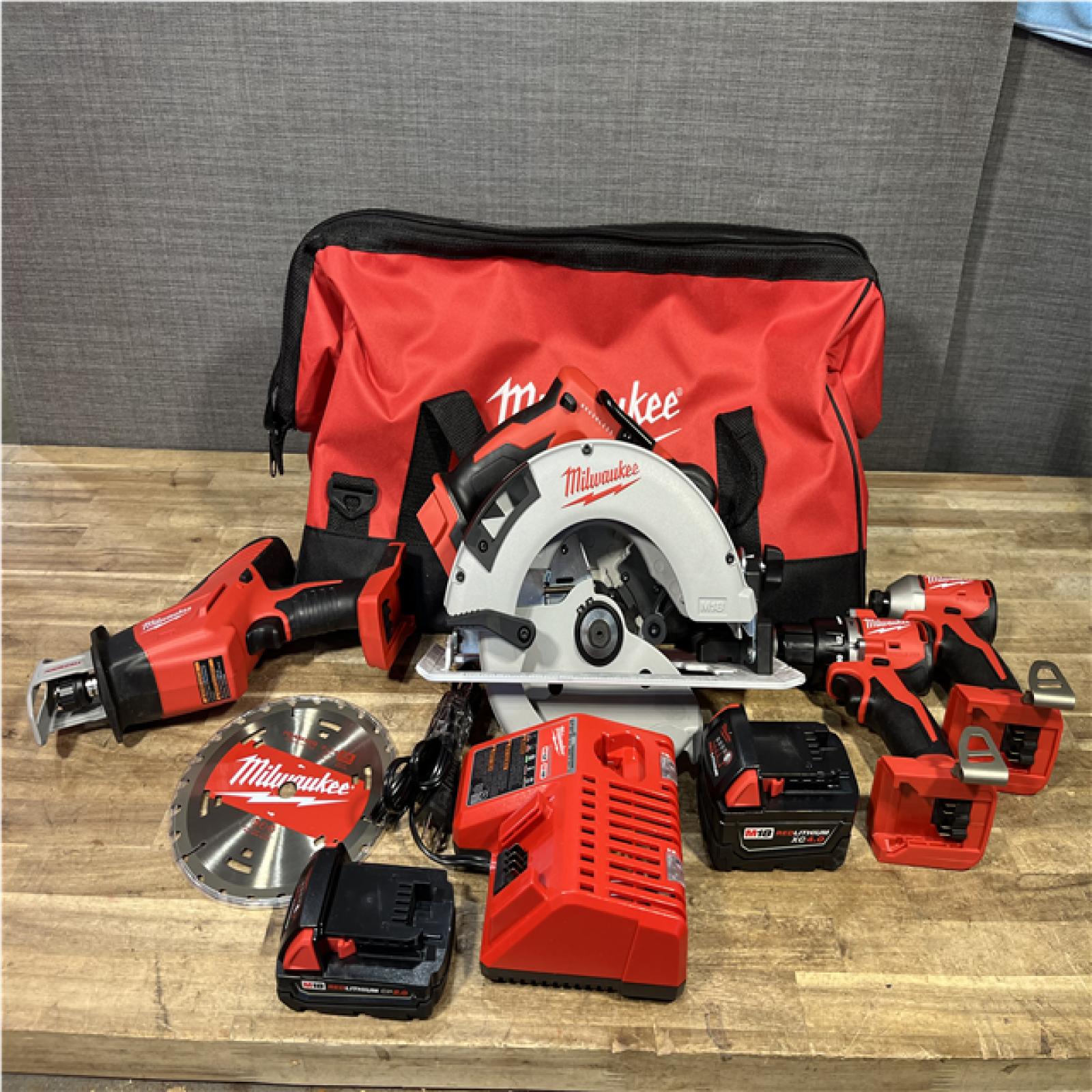 Houston Location AS-IS Milwaukee 18-Volt Lithium-Ion Brushless Cordless (4-Tool) Combo Kit