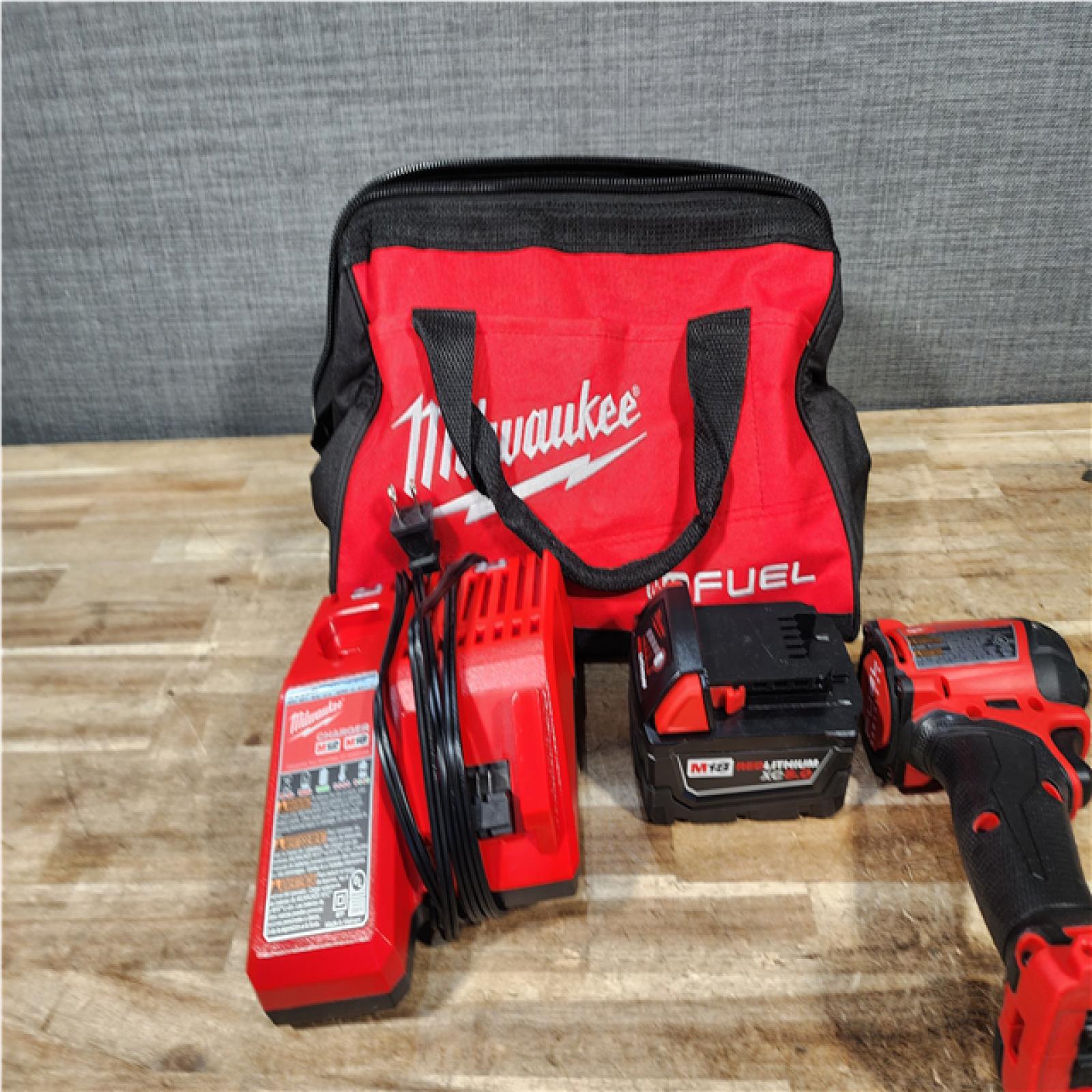 HOUSTON LOCATION - AS - IS Milwaukee  FUEL SURGE 18V Lithium-Ion Brushless Cordless 1/4 in. Hex Impact Driver with (1) 5.0 Ah Battery and Charger