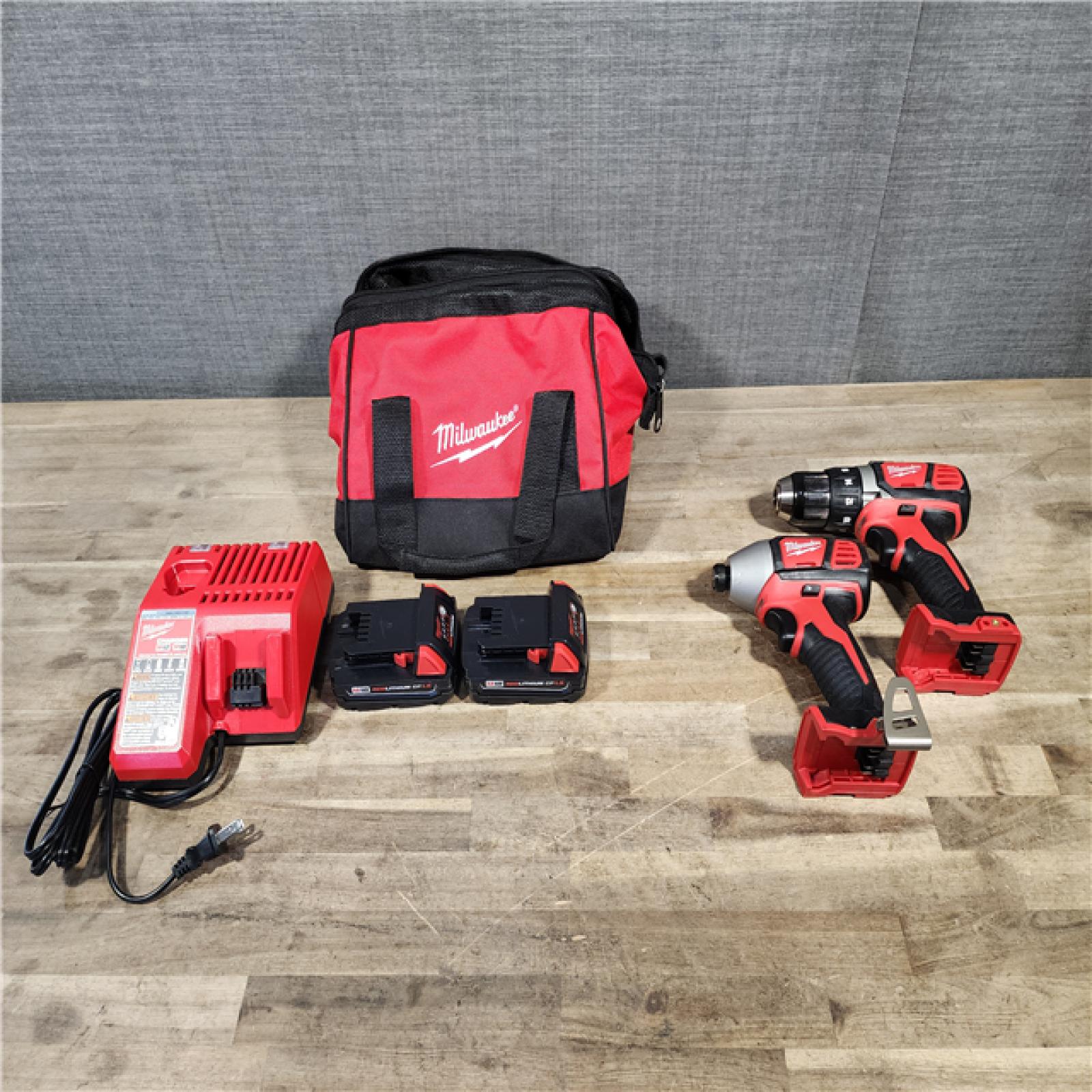 HOUSTON LOCATION - AS-IS Milwaukee 18V Cordless Brushed 2-Tool Drill/Driver and Impact Driver Kit