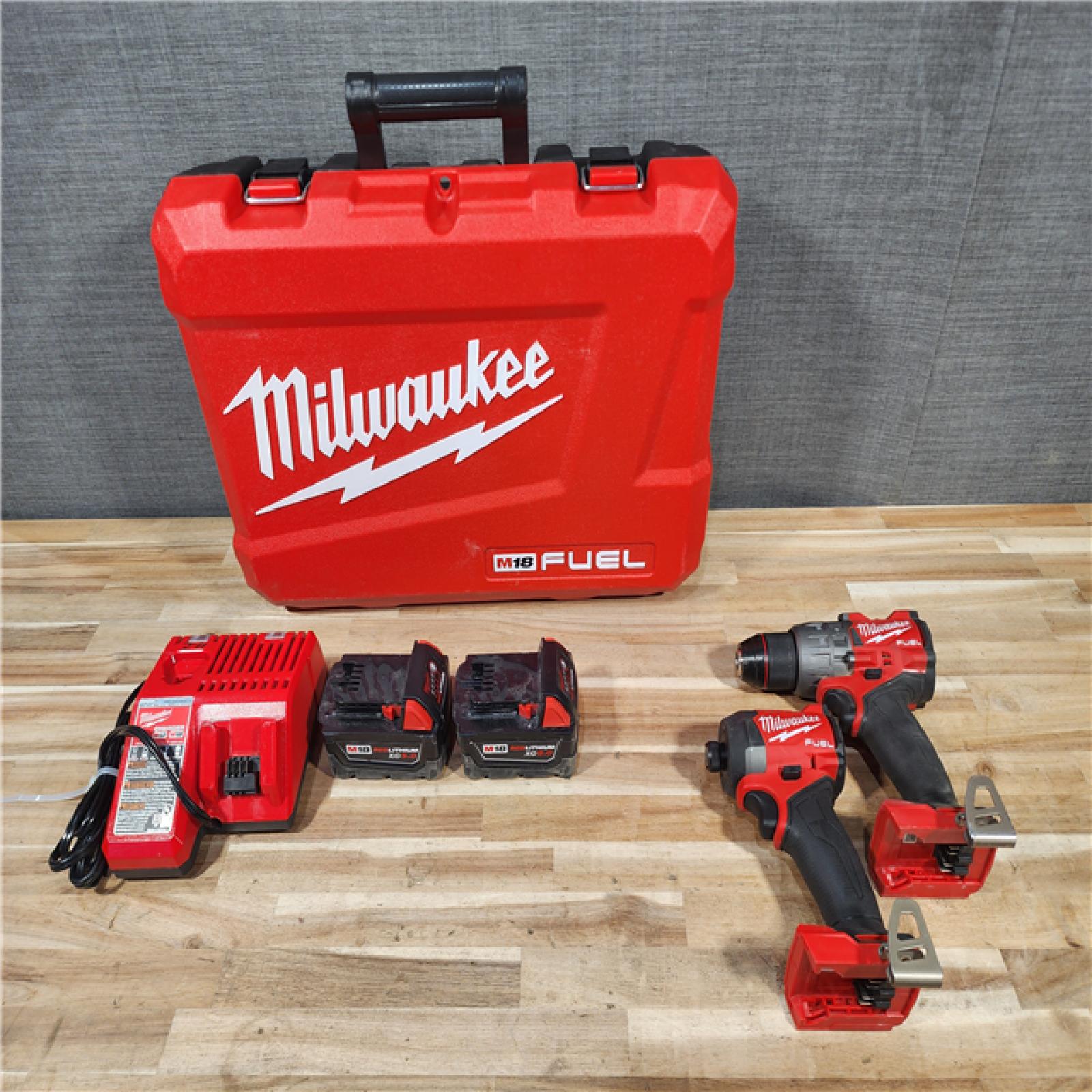 HOUSTON LOCATION - AS-IS Milwaukee  FUEL 18V Lithium-Ion Brushless Cordless Hammer Drill and Impact Driver Combo Kit