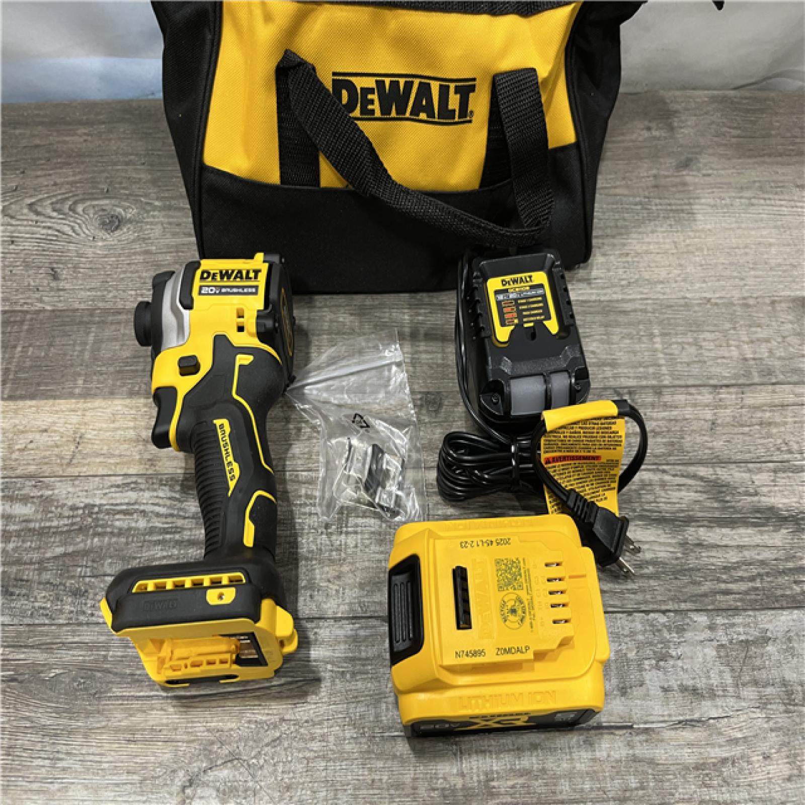 AS-IS DEWALT ATOMIC 20V MAX Lithium-Ion Cordless 1/4 in. Brushless Impact Driver Kit