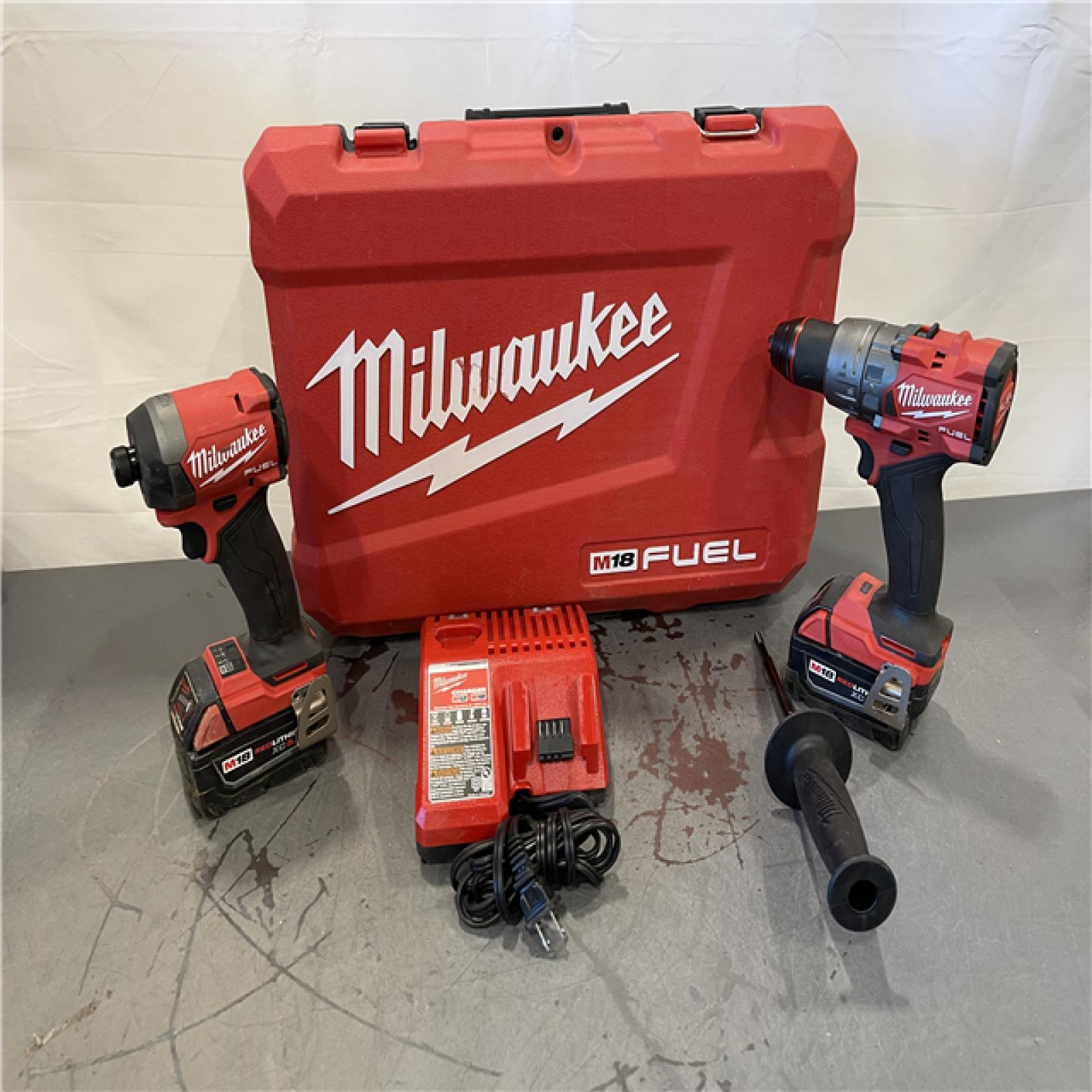 AS-IS - MILWAUKEE M18 FUEL 18V Lithium-Ion Brushless Cordless Hammer Drill and Impact Driver Combo Kit