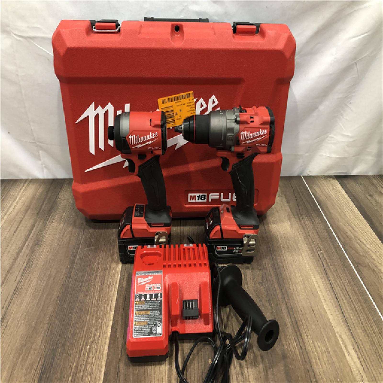 AS-IS Milwaukee FUEL 18V Lithium-Ion Brushless Cordless Hammer Drill and Impact Driver Combo Kit