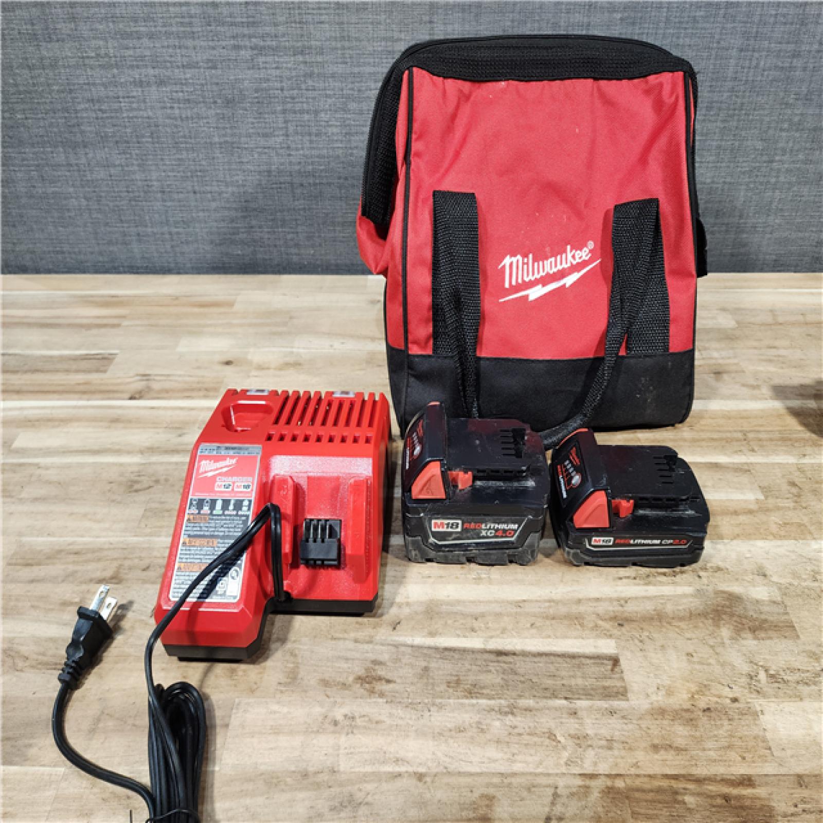 HOUSTON LOCATION - AS-IS Milwaukee 18-Volt Lithium-Ion Brushless Cordless Compact Hammer Drill/Impact Combo Kit