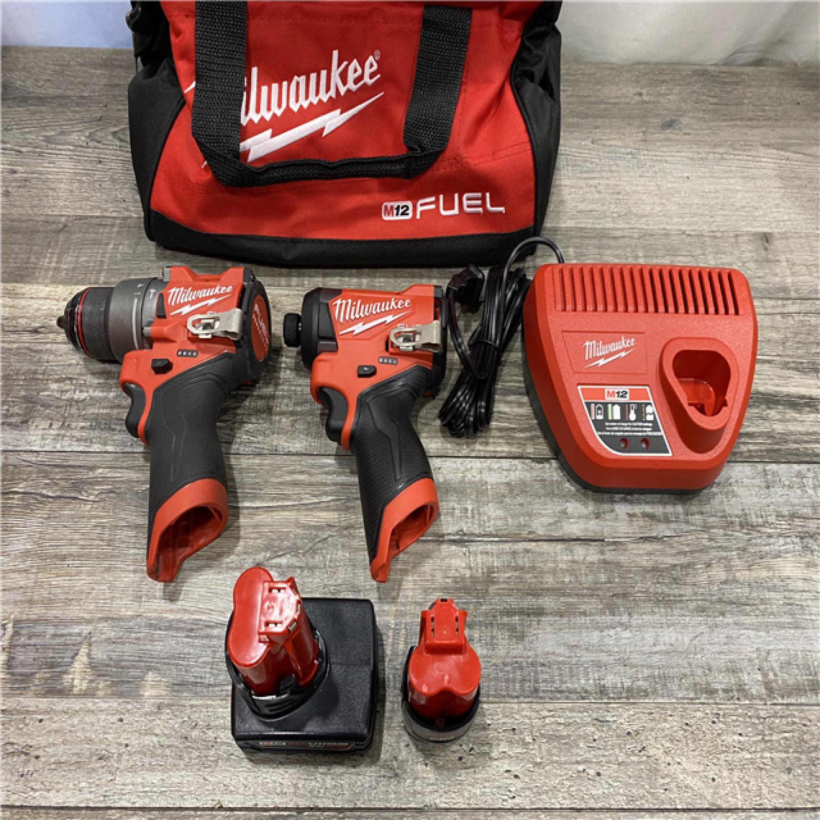 AS-IS Milwaukee FUEL 12-Volt Lithium-Ion Brushless Cordless Hammer Drill and Impact Driver Combo Kit