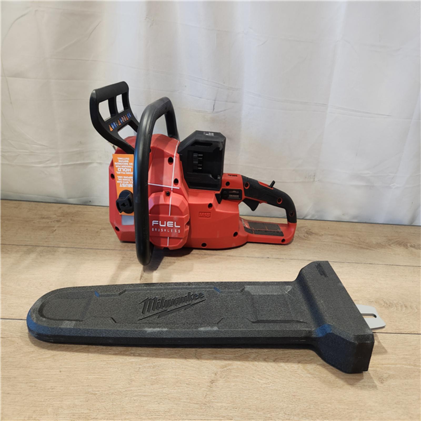 AS-IS- Milwaukee M18 FUEL Cordless 20 in. Chainsaw Kit