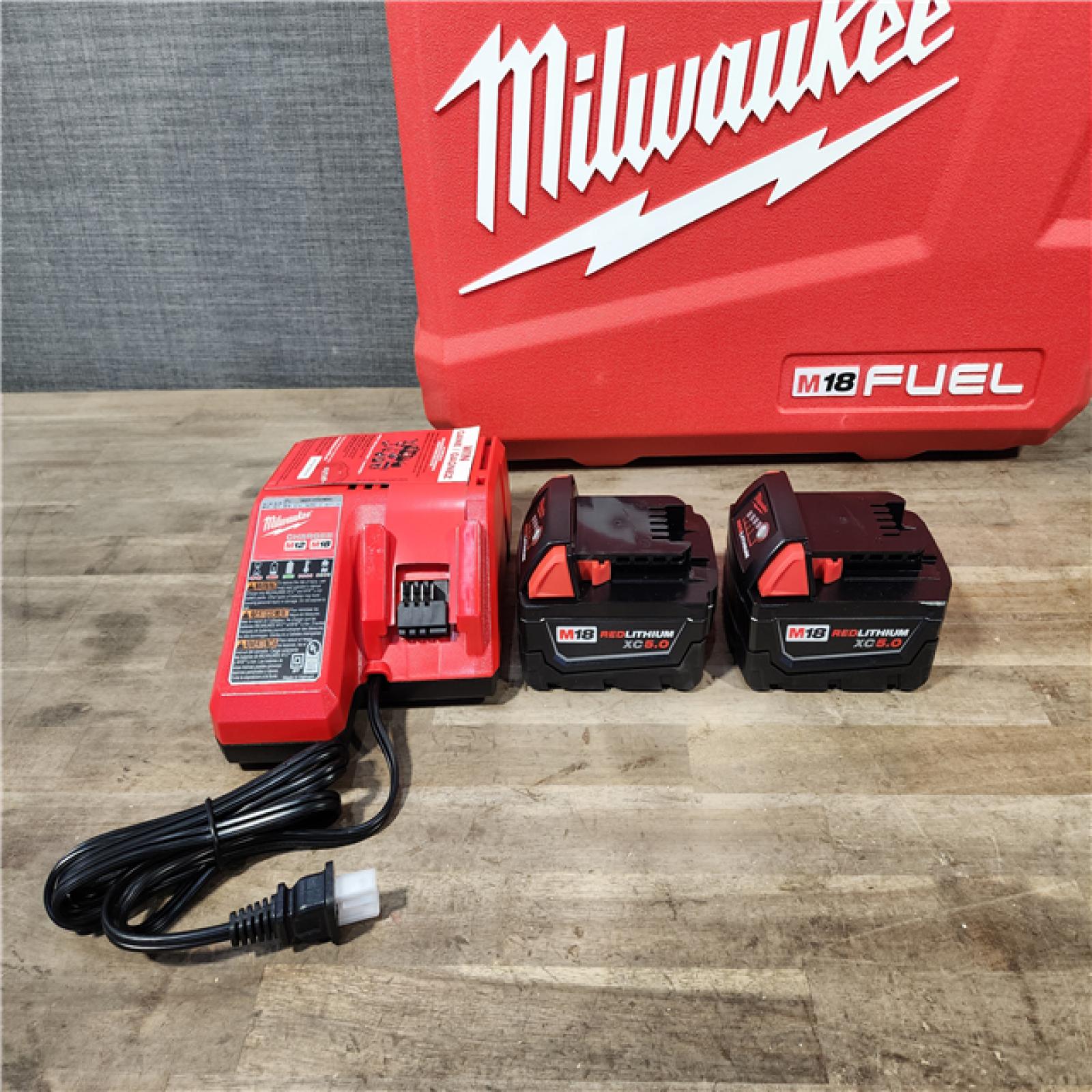 HOUSTON LOCATION - AS-IS MILWAUKEE FUEL 18V Lithium-Ion Brushless Cordless Hammer Drill and Impact Driver Combo Kit