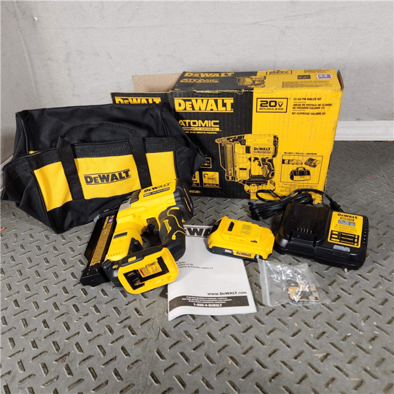 Houston Location - AS-IS DEWALT ATOMIC 20V MAX Lithium Ion Cordless 23 Gauge Pin Nailer Kit with 2.0Ah Battery and Charger (DCN623D1) (no tool bag) - Appears  IN GOOD Condition