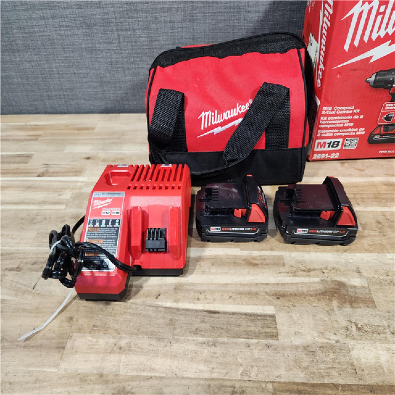 HOUSTON LOCATION - AS-IS Milwaukee M18 18V Lithium-Ion Cordless Drill Driver/Impact Driver Combo Kit