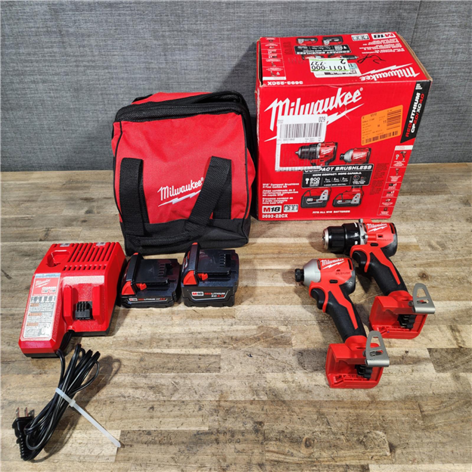 HOUSTON LOCATION - AS-IS M18 18-Volt Lithium-Ion Brushless Cordless Compact Hammer Drill/Impact Combo Kit (2-Tool) with (2) Batteries  Bag