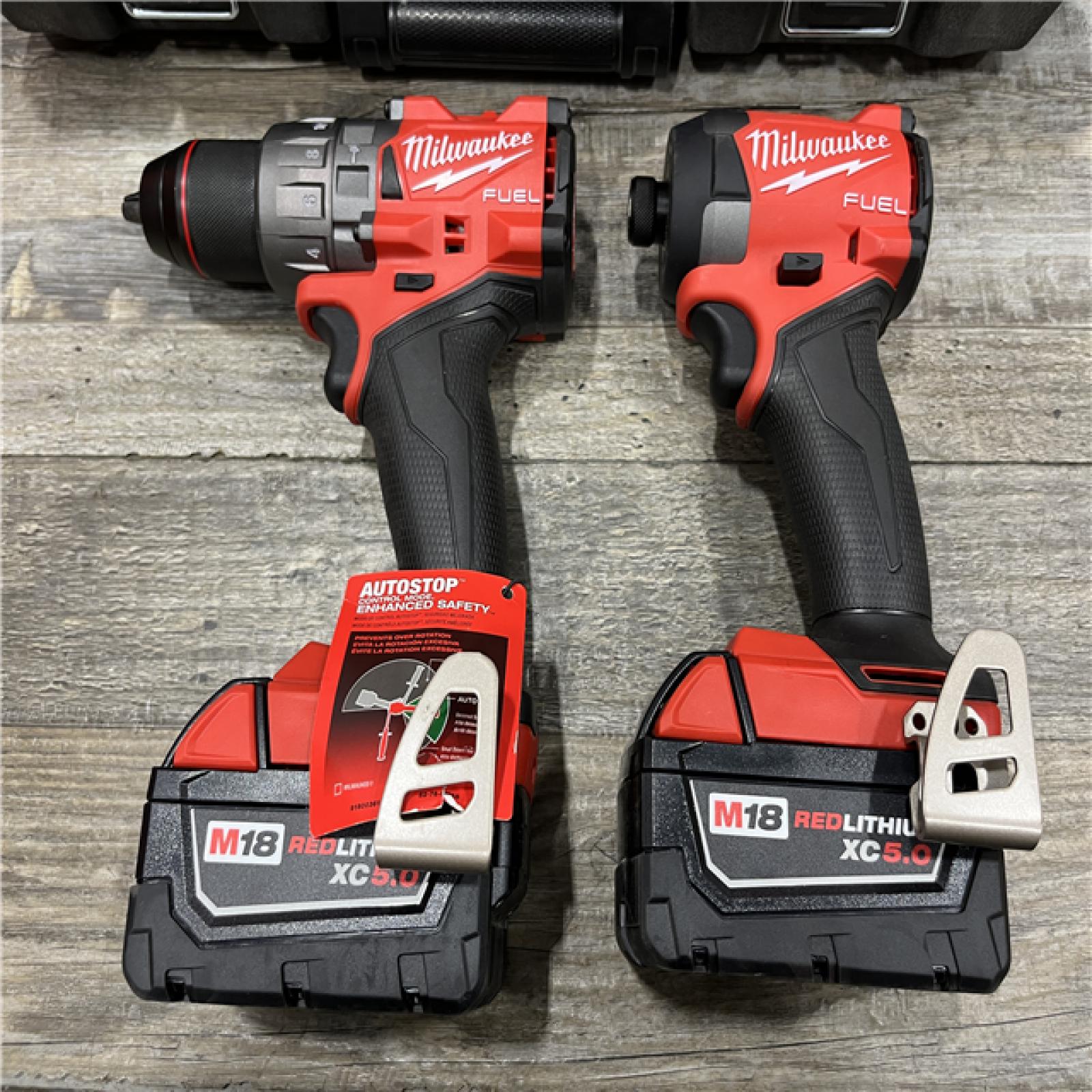 AS-IS Milwaukee FUEL 18V Lithium-Ion Brushless Cordless Hammer Drill and Impact Driver Combo Kit