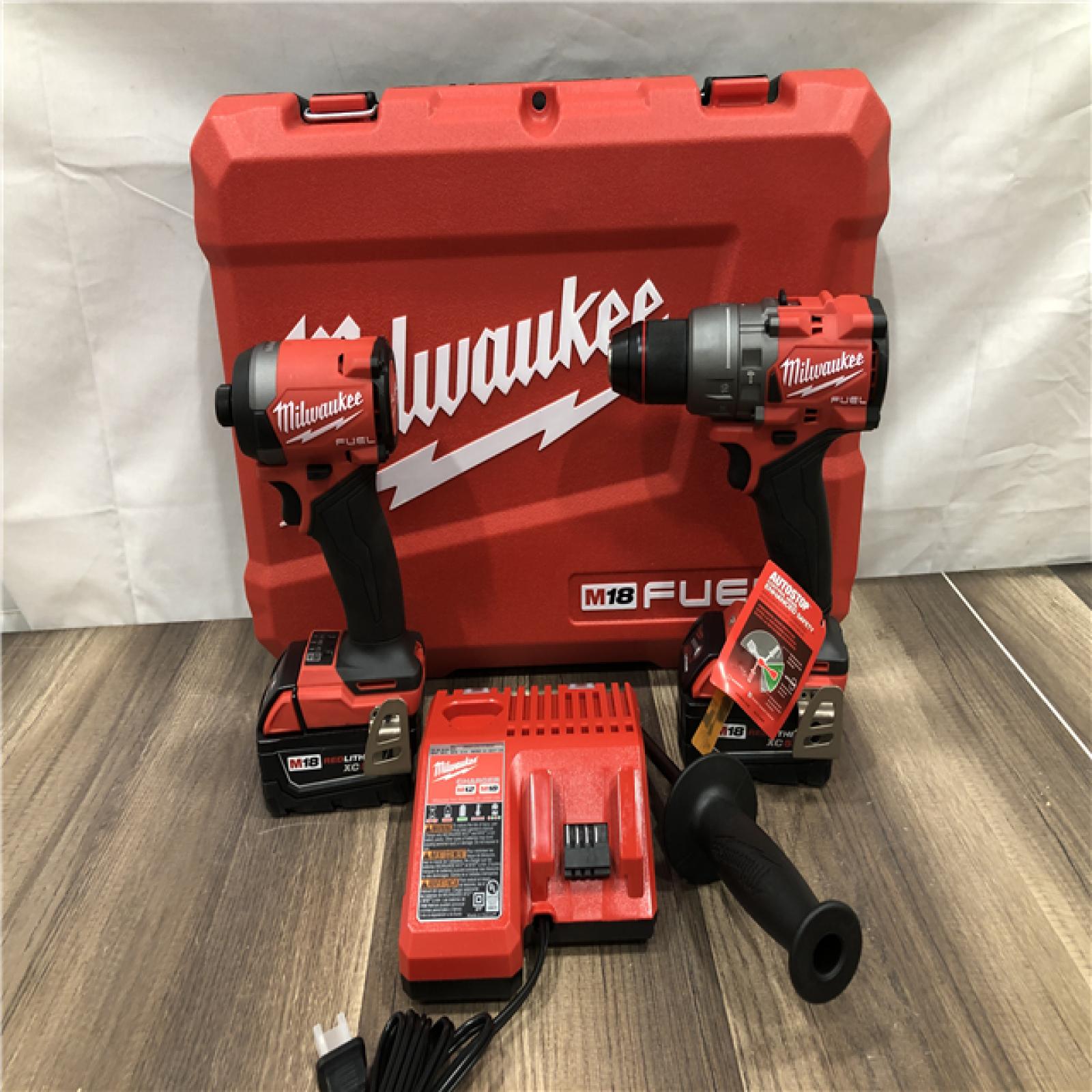 AS-IS Milwaukee FUEL 18V Lithium-Ion Brushless Cordless Hammer Drill and Impact Driver Combo Kit