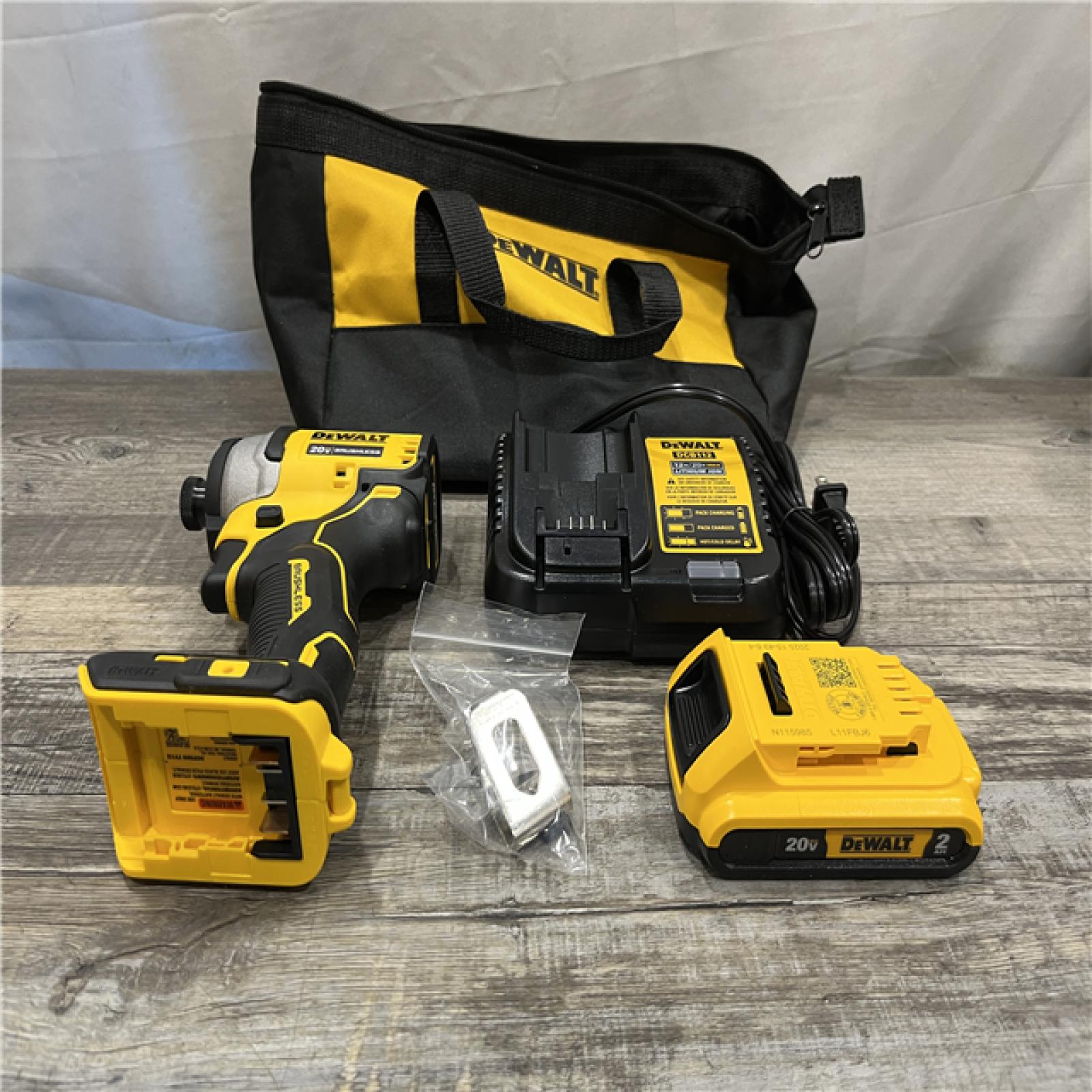 AS-IS DEWALT Atomic 20V Max Lithium-Ion Brushless Cordless Compact 1/4 in. Impact Driver Kit
