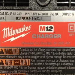 AS-IS Milwaukee 12V Lithium-Ion XC High Output 5.0 Ah Battery Pack (2-Pack) Starter Kit with Charger