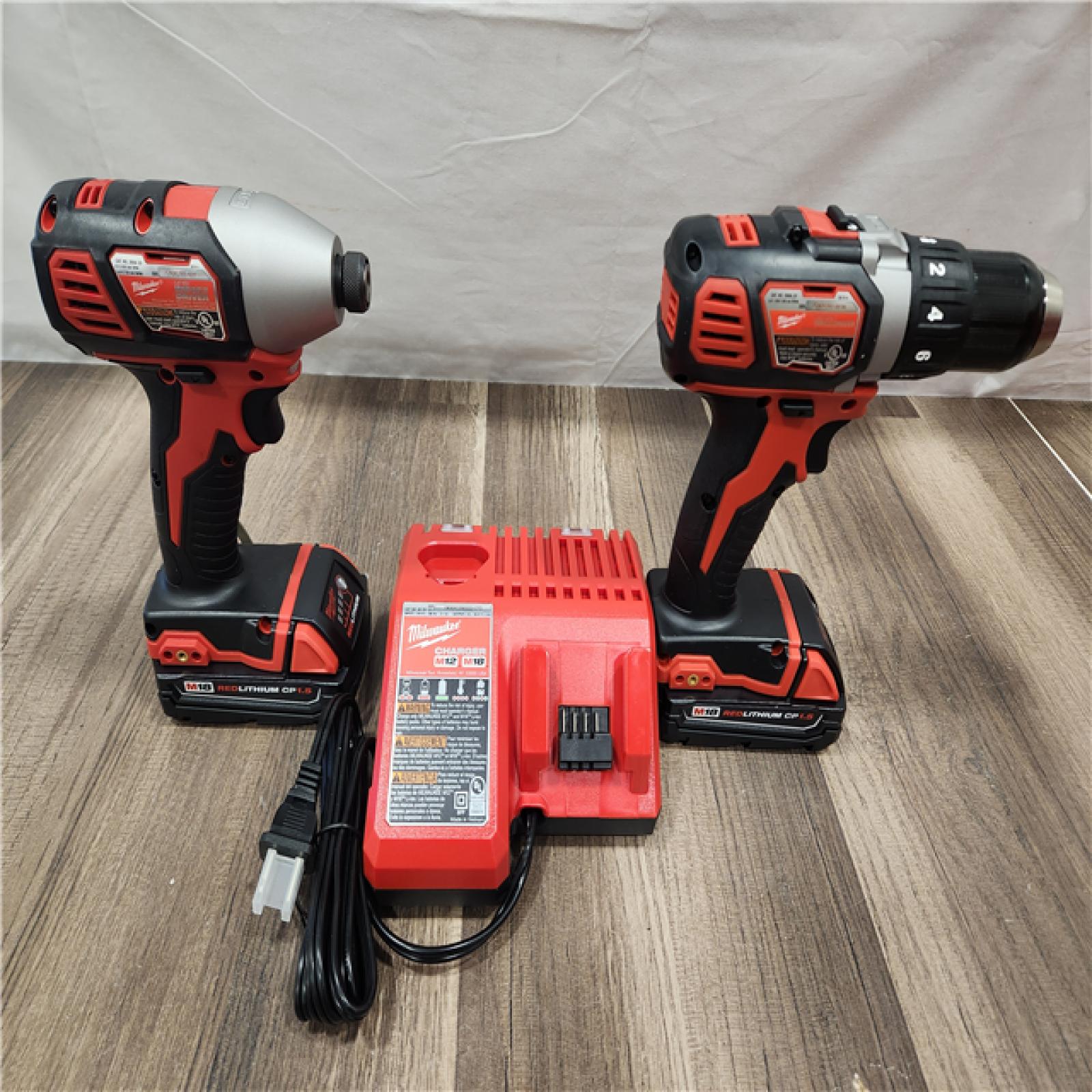 AS-IS- Milwaukee 18V Cordless Brushed 2-Tool Drill/Driver and Impact Driver Kit