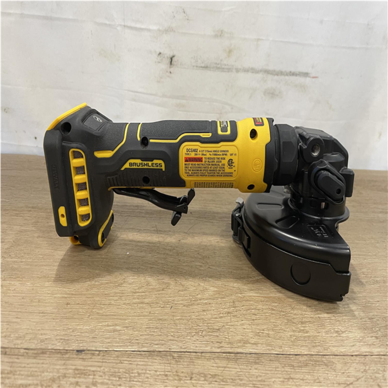 AS-IS DEWALT ATOMIC 20V MAX Cordless 4-1/2 in. Angle Grinder with Paddle Switch (Tool Only)