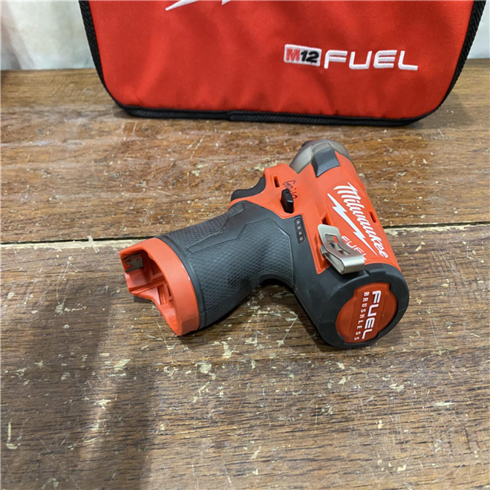AS-IS M12 FUEL SURGE 12V Lithium-Ion Brushless Cordless 1/4 in. Hex Impact Driver Compact Kit W/Two 2.0Ah Batteries, Bag
