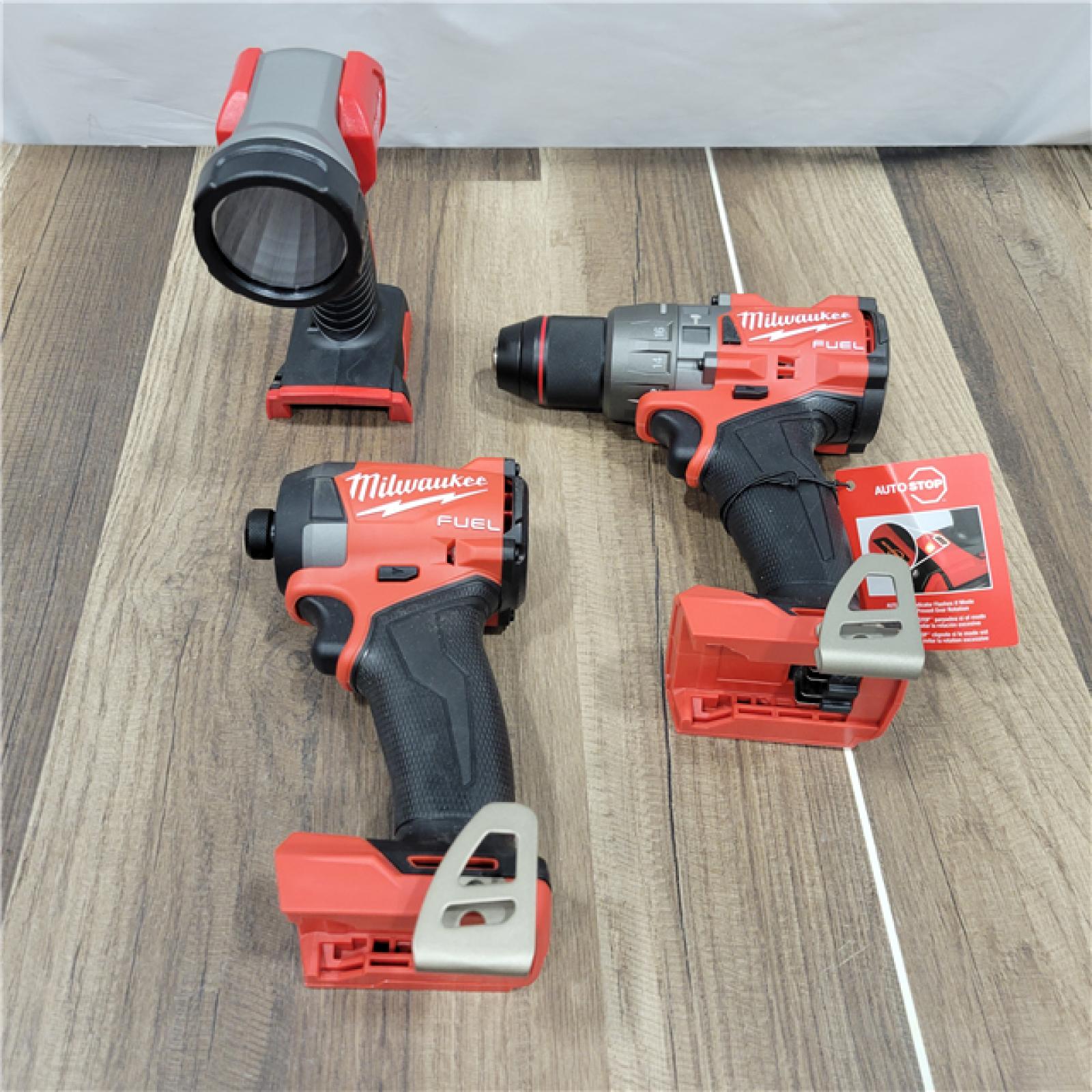 AS-IS Milwaukee M18 FUEL 18V Lithium-Ion Brushless Cordless Combo Kit (5-Tool) with Two 5.0 Ah Batteries, 1 Charger 1 Tool Bag