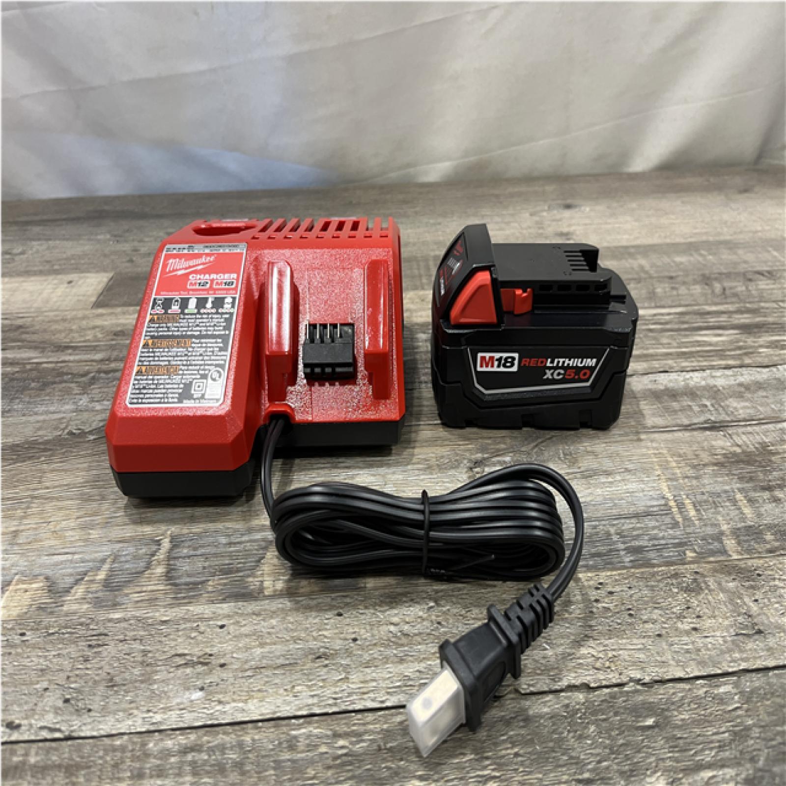 AS-IS Milwaukee 18-Volt Lithium-Ion XC Starter Kit with One 5.0Ah Battery and Charger
