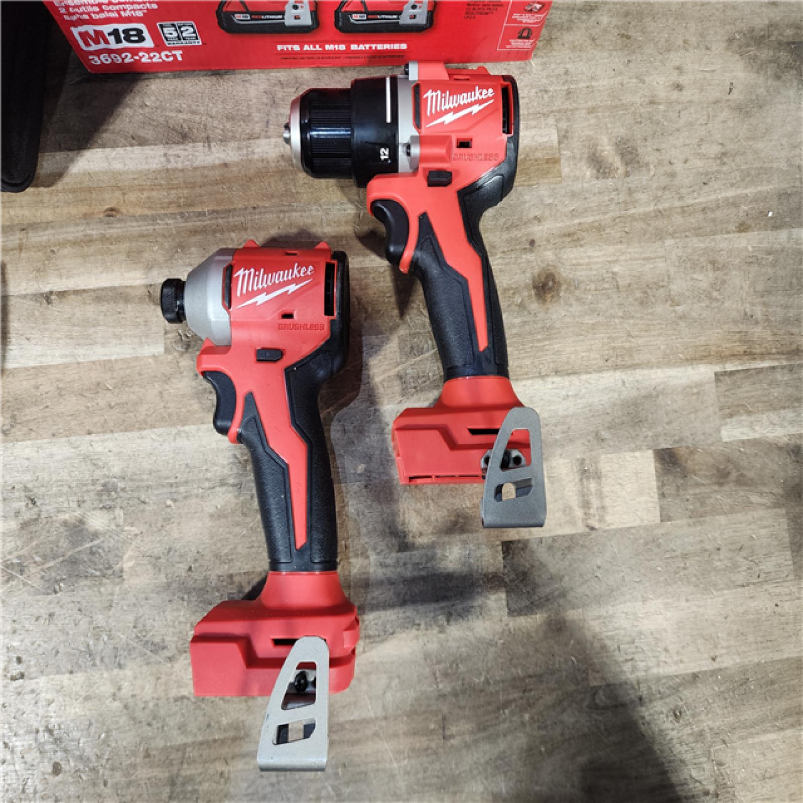 HOUSTON LOCATION - AS-IS Milwaukee M18 18V Lithium-Ion Brushless Cordless Compact Drill/Impact Combo Kit (2-Tool) W/(2) 2.0 Ah Batteries  Charger & Bag