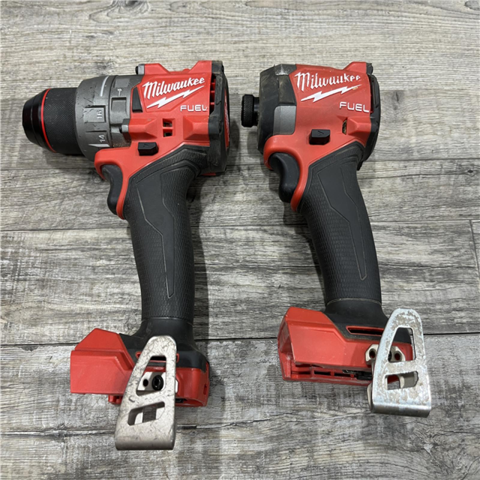 AS-IS Milwaukee FUEL 18V Lithium-Ion Brushless Cordless Hammer Drill and Impact Driver Combo Kit