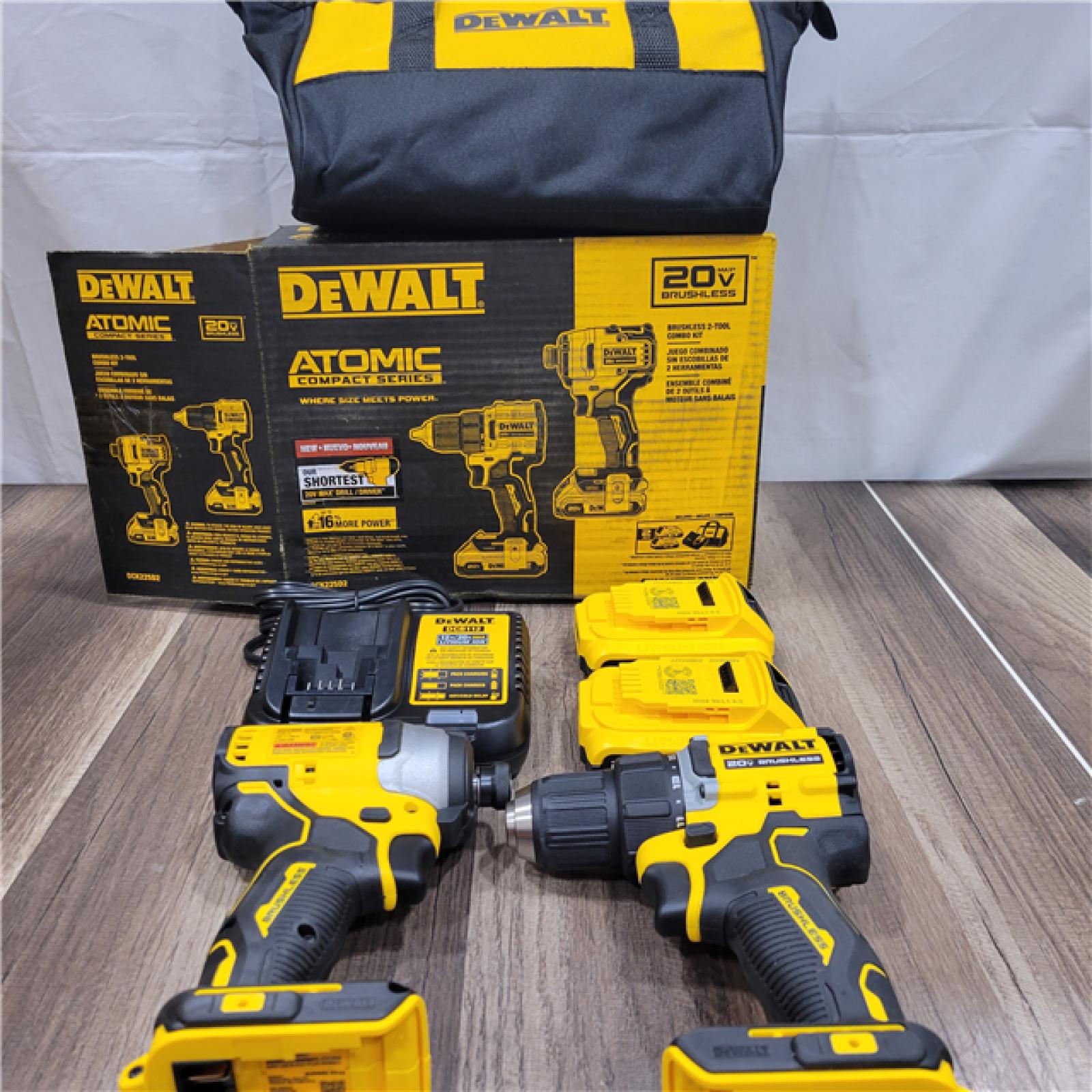 AS-IS Dewalt 20V MAX ATOMIC Brushless Compact Lithium-Ion 1/2 in. Cordless Drill Driver and 1/4 in. Impact Driver Combo Kit with 2 Batteries 2 Ah