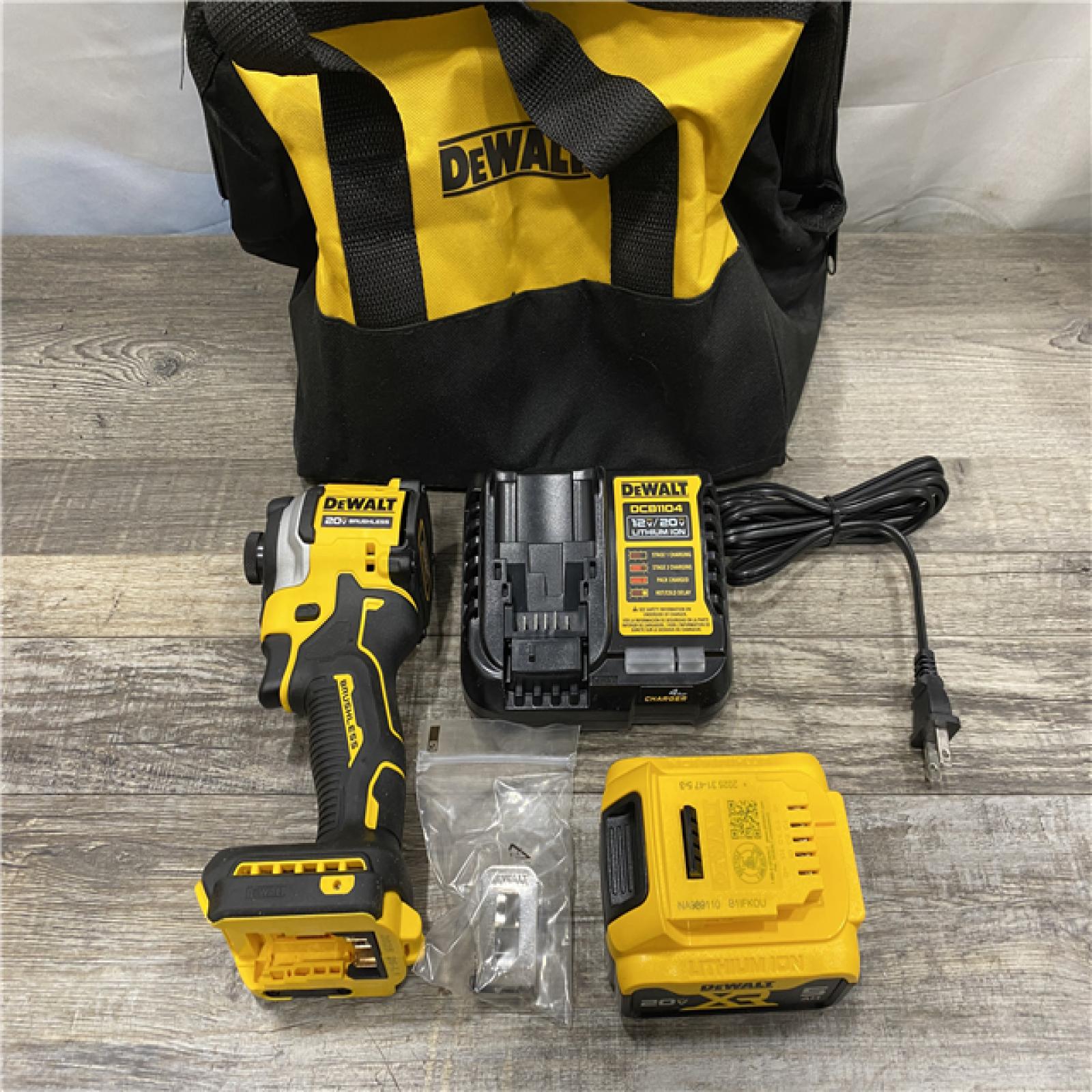 AS-IS DEWALT ATOMIC 20V MAX Lithium-Ion Cordless 1/4 in. Brushless Impact Driver Kit
