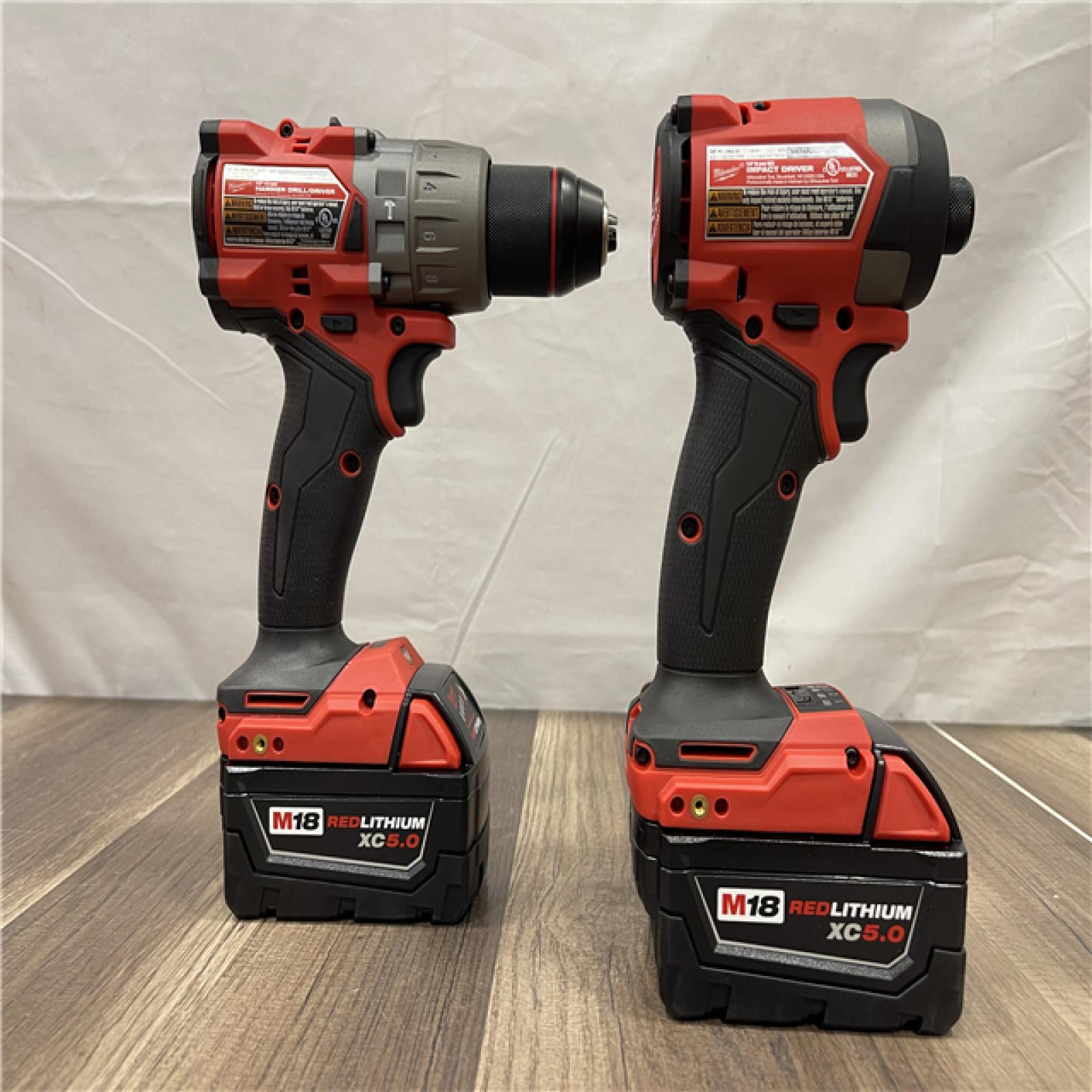 AS-IS Milwaukee M18 FUEL 18V Lithium-Ion Brushless Cordless Hammer Drill and Impact Driver Combo Kit