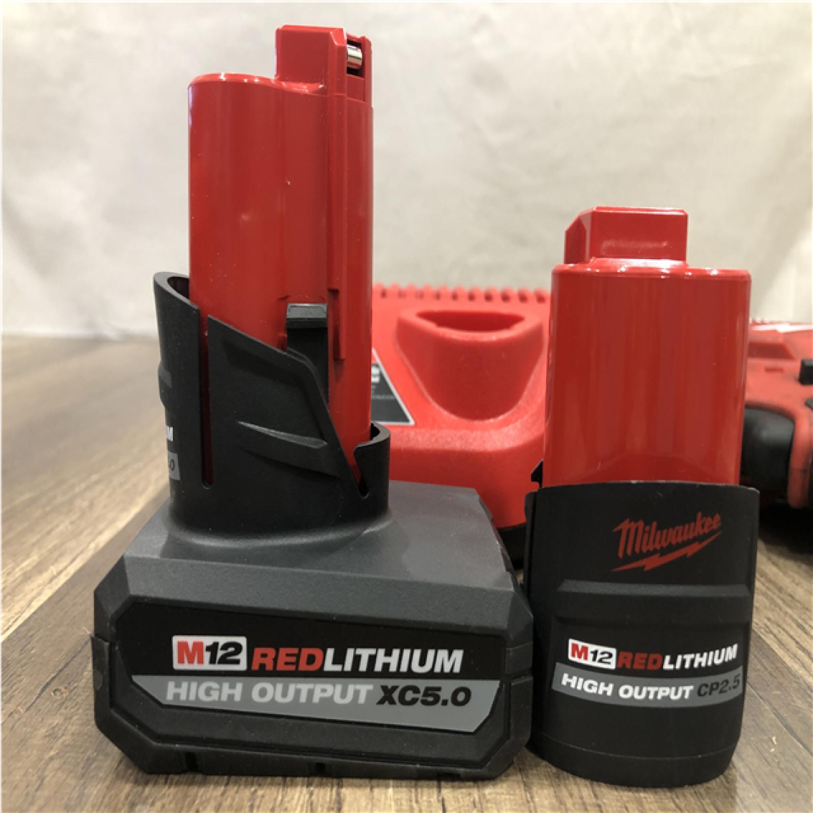 AS-IS Milwaukee FUEL 12V Li-Ion Brushless Cordless Stubby 1/2 in. Impact Wrench Kit