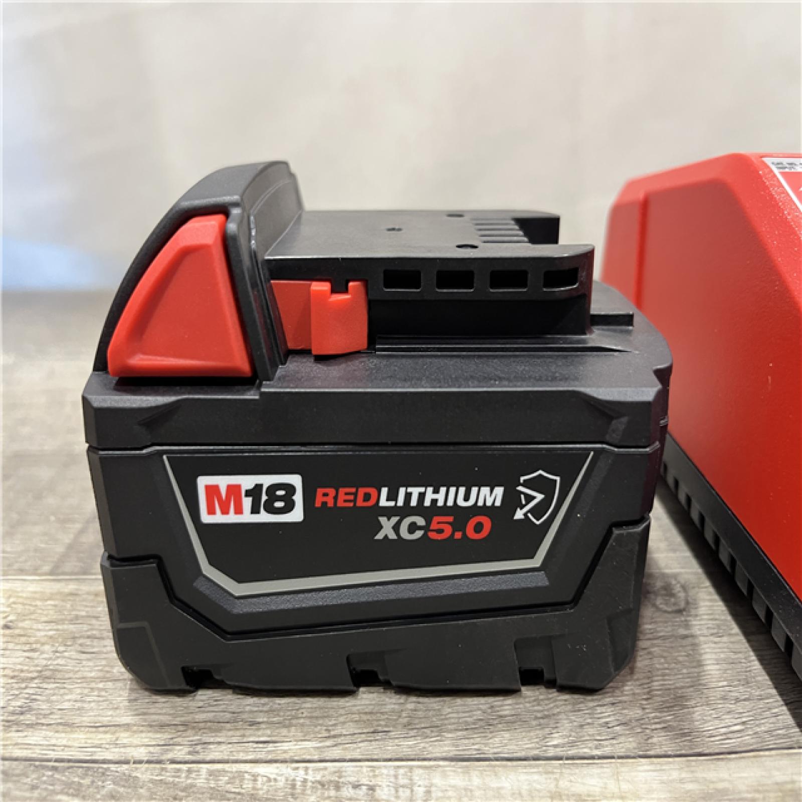 AS-IS Milwaukee 18-Volt Lithium-Ion XC Starter Kit with One 5.0Ah Battery and Charger