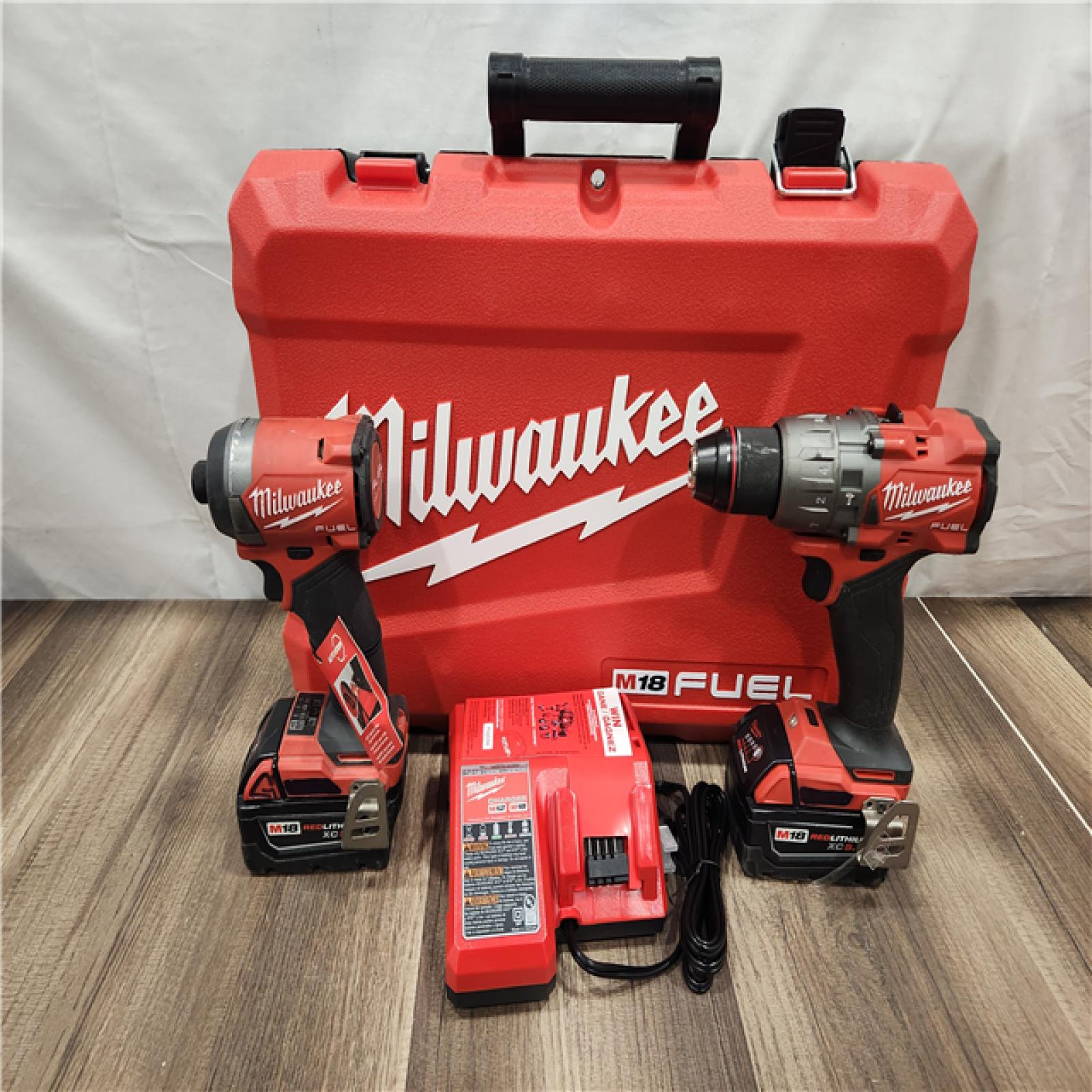 AS-IS- MILWAUKEE FUEL 18V Lithium-Ion Brushless Cordless Hammer Drill and Impact Driver Combo Kit