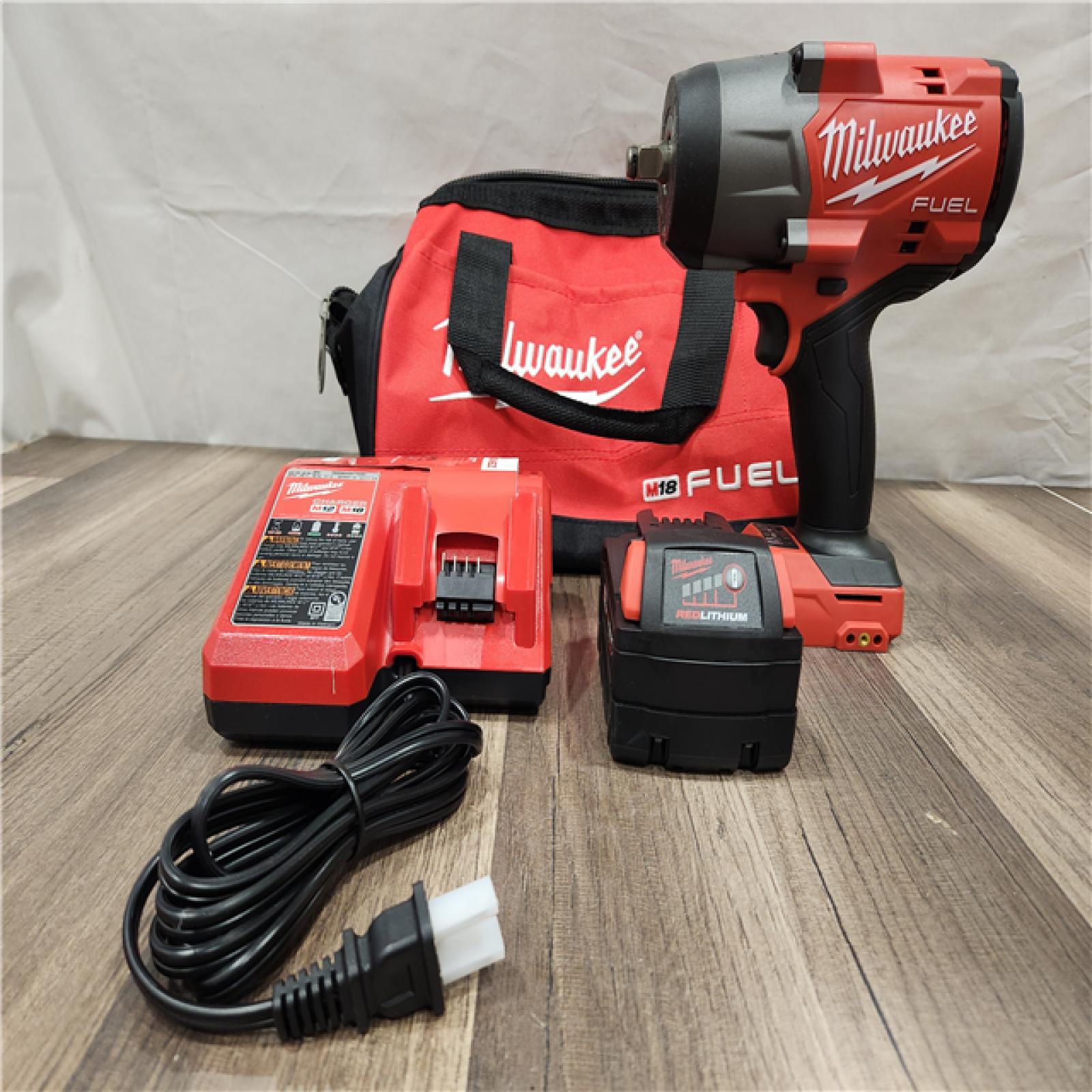 AS-IS- Milwaukee M18 1/2 in. Cordless Brushless High Torque Impact Wrench Kit (Battery & Charger)