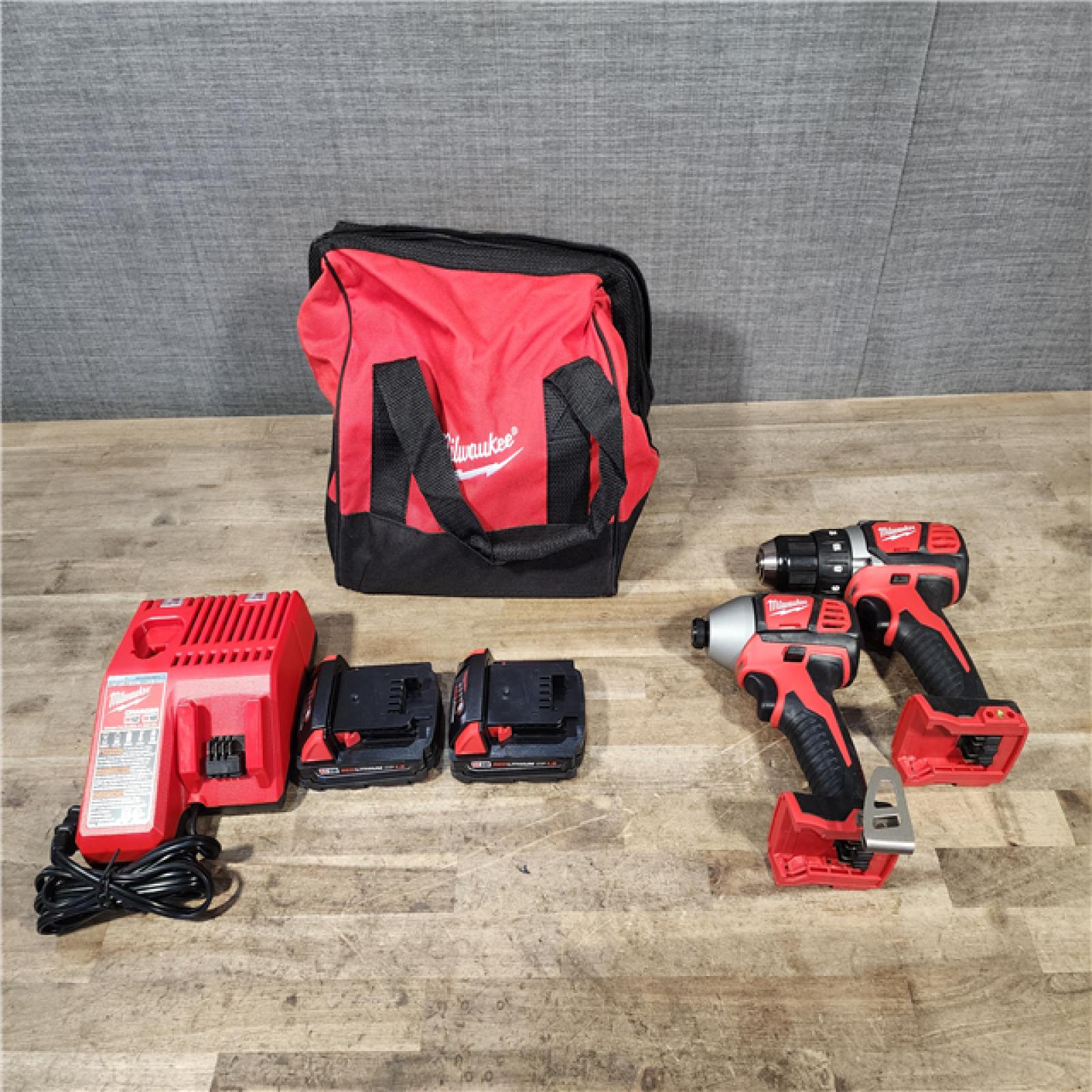 HOUSTON LOCATION - AS-IS Milwaukee 18V Cordless Brushed 2-Tool Drill/Driver and Impact Driver Kit