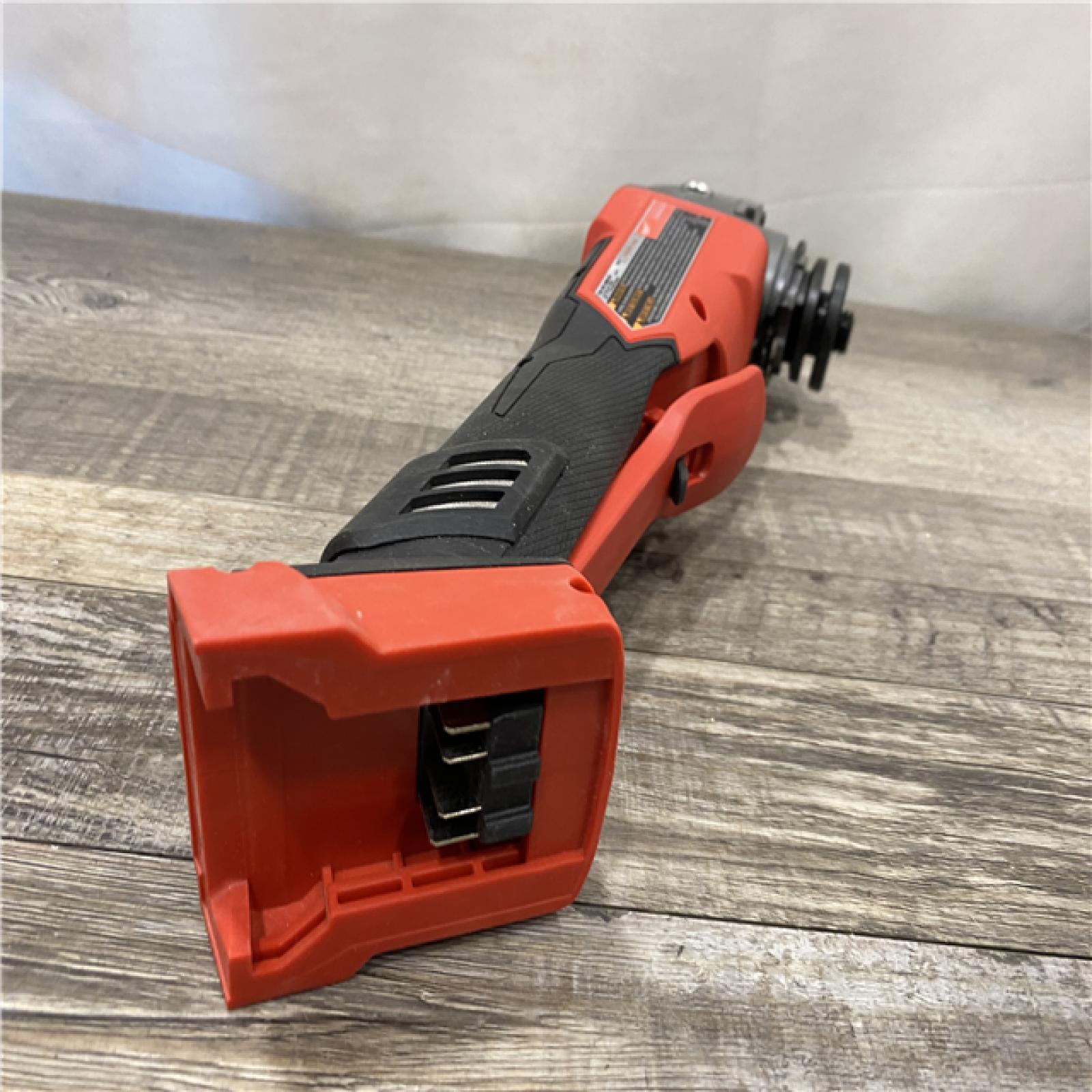 AS-IS Milwaukee FUEL 18V Lithium-Ion Brushless Cordless 4-1/2 in./5 in. Grinder with Variable Speed & Paddle Switch (Tool-Only)