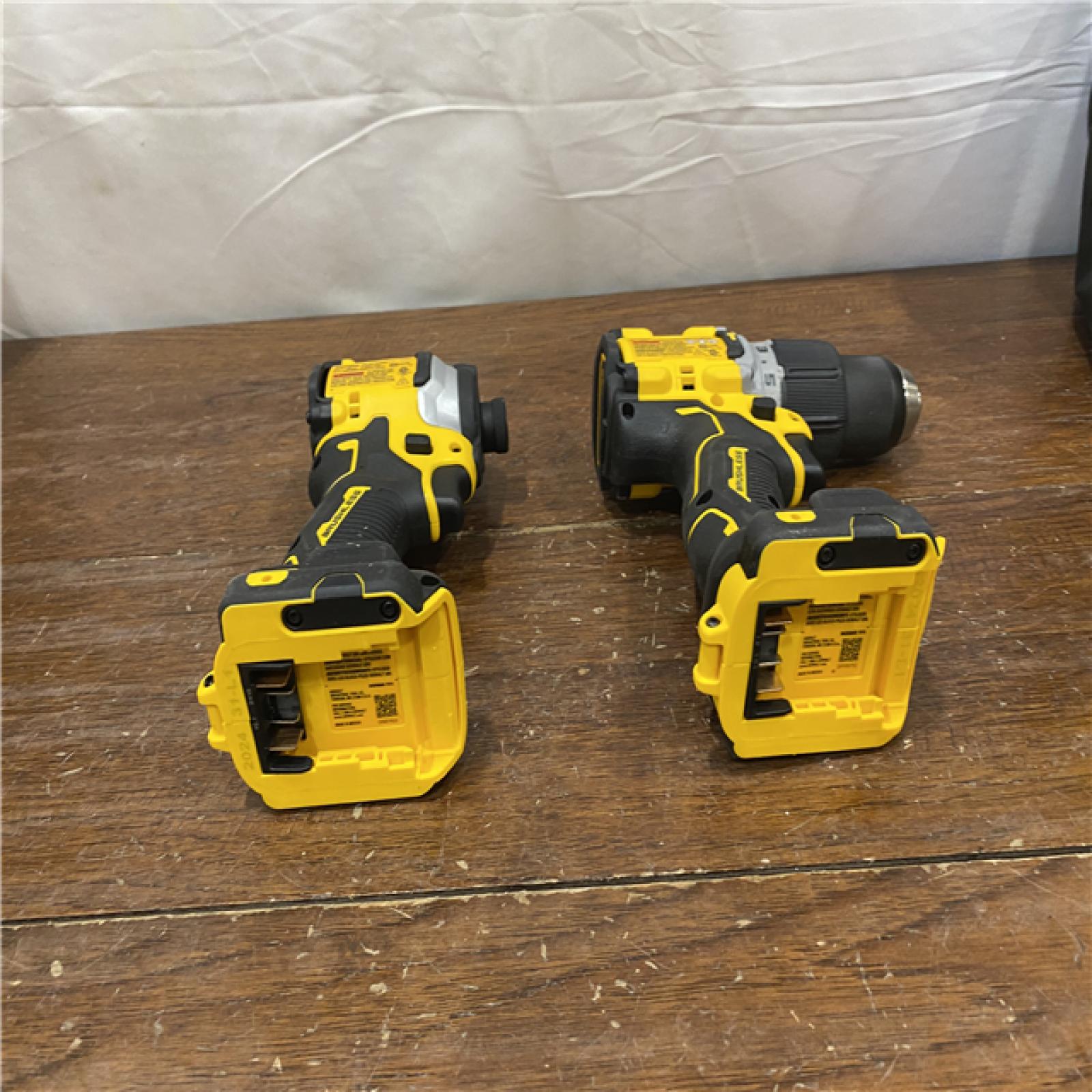 AS-IS DEWALT 20V MAX XR Hammer Drill and ATOMIC Impact Driver 2 Tool Cordless Combo Kit with (2) 4.0Ah Batteries, Charger, and Bag