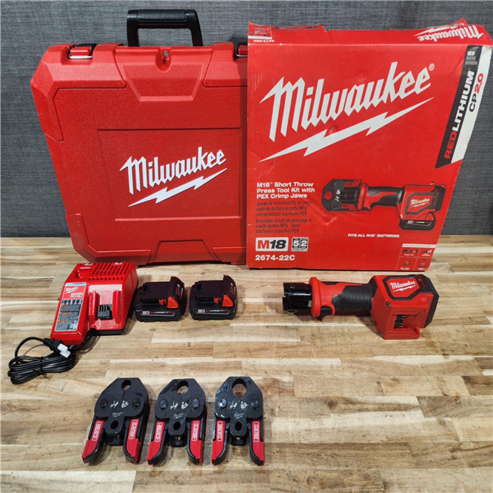 HOUSTON LOCATION - AS-IS (APPEARS LIKE NEW) Milwaukee 18V Lithium-Ion Cordless Short Throw Press Tool with 3 PEX Crimp Jaws Kit