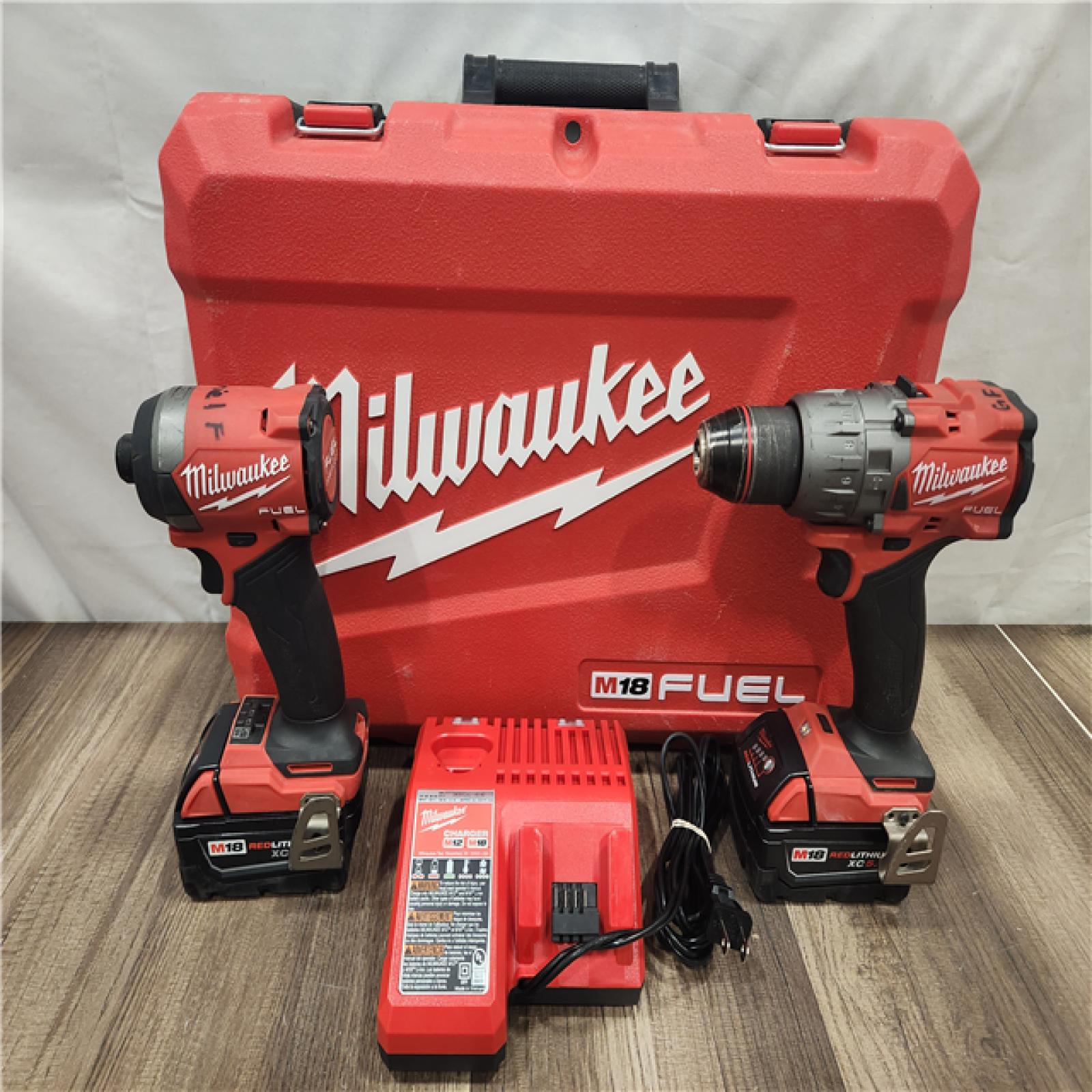 AS-IS- MILWAUKEE FUEL 18V Lithium-Ion Brushless Cordless Hammer Drill and Impact Driver Combo Kit