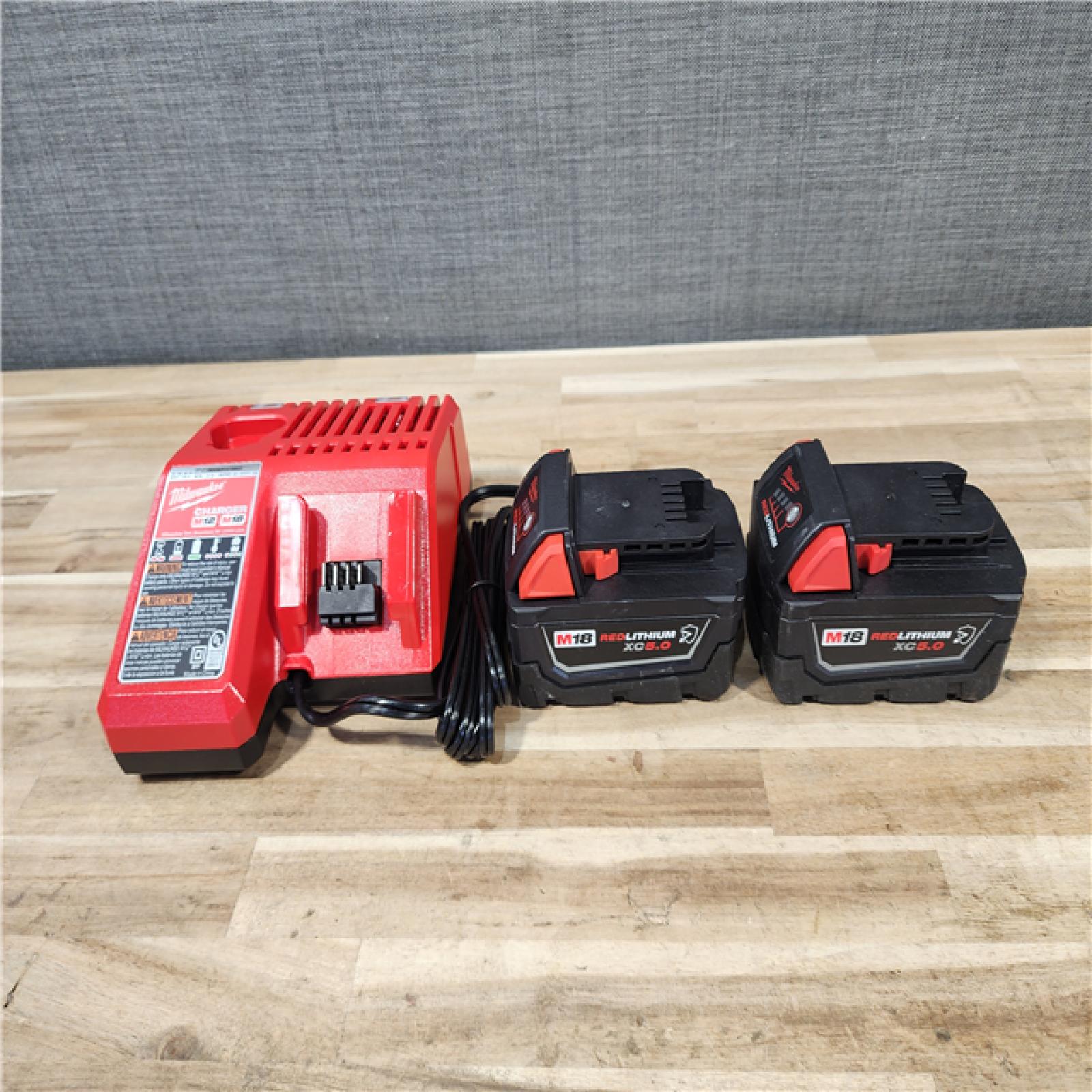 HOUSTON LOCATION - AS-IS MILWAUKEE 2 TOOL COMBO KIT W/ (2) BATTERY & CHARGER