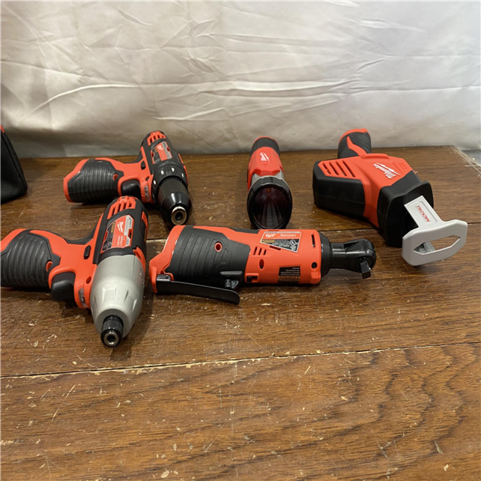 AS-IS MILWAUKEE M12 12V Lithium-Ion Cordless Combo Kit (5-Tool) with Two 1.5Ah Batteries, Charger & Tool Bag
