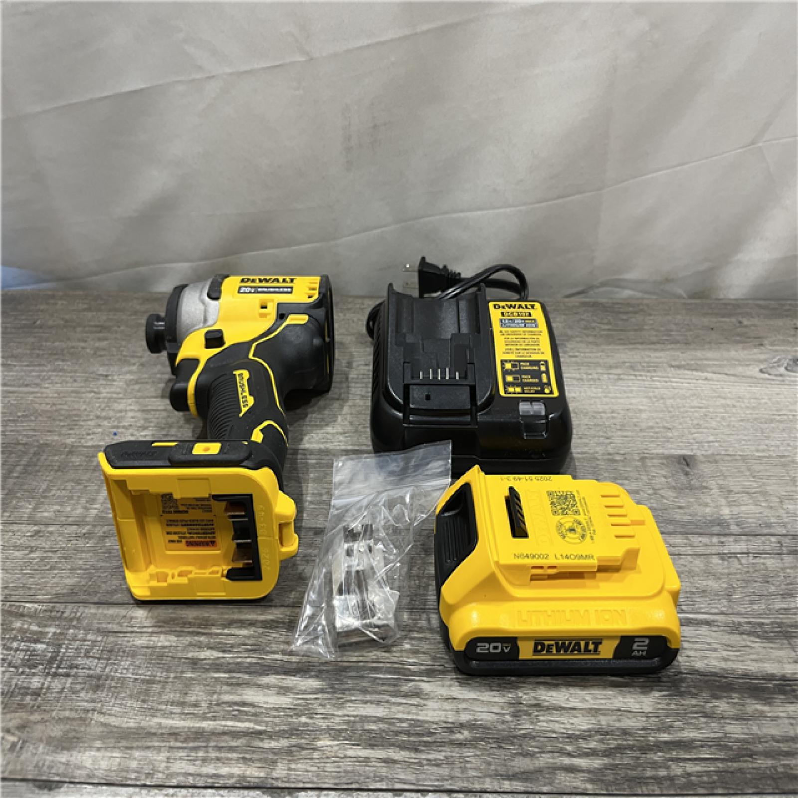 AS-IS DEWALT Atomic 20V Max Lithium-Ion Brushless Cordless Compact 1/4 in. Impact Driver Kit