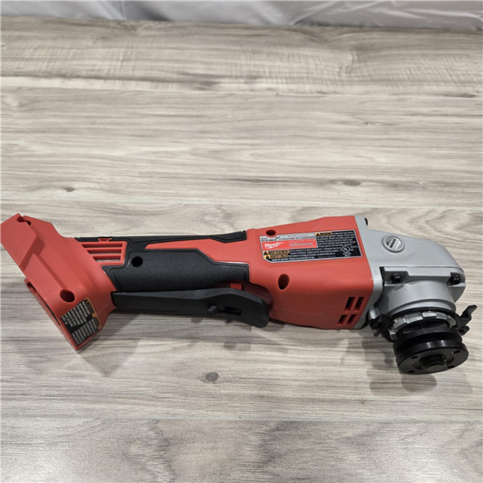 AS-IS Milwaukee 2686-20 18V Cordless 4.5 /5  Grinder W/ Paddle Switch (Tool Only)