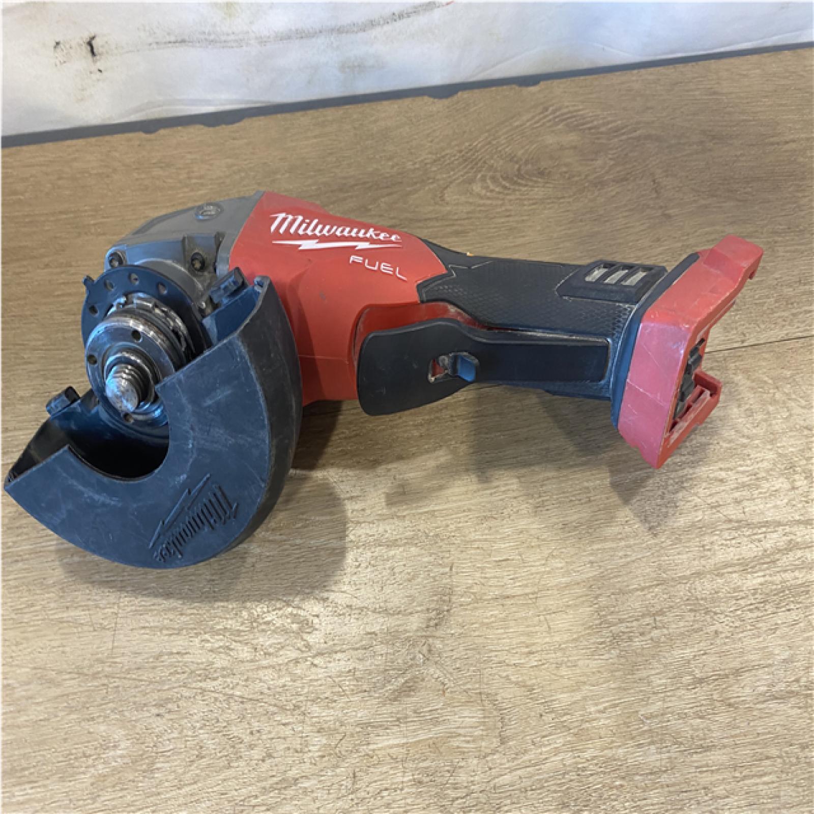 AS-IS Milwaukee FUEL 18V Lithium-Ion Brushless Cordless 4-1/2 in./5 in. Grinder w/Paddle Switch (Tool-Only)