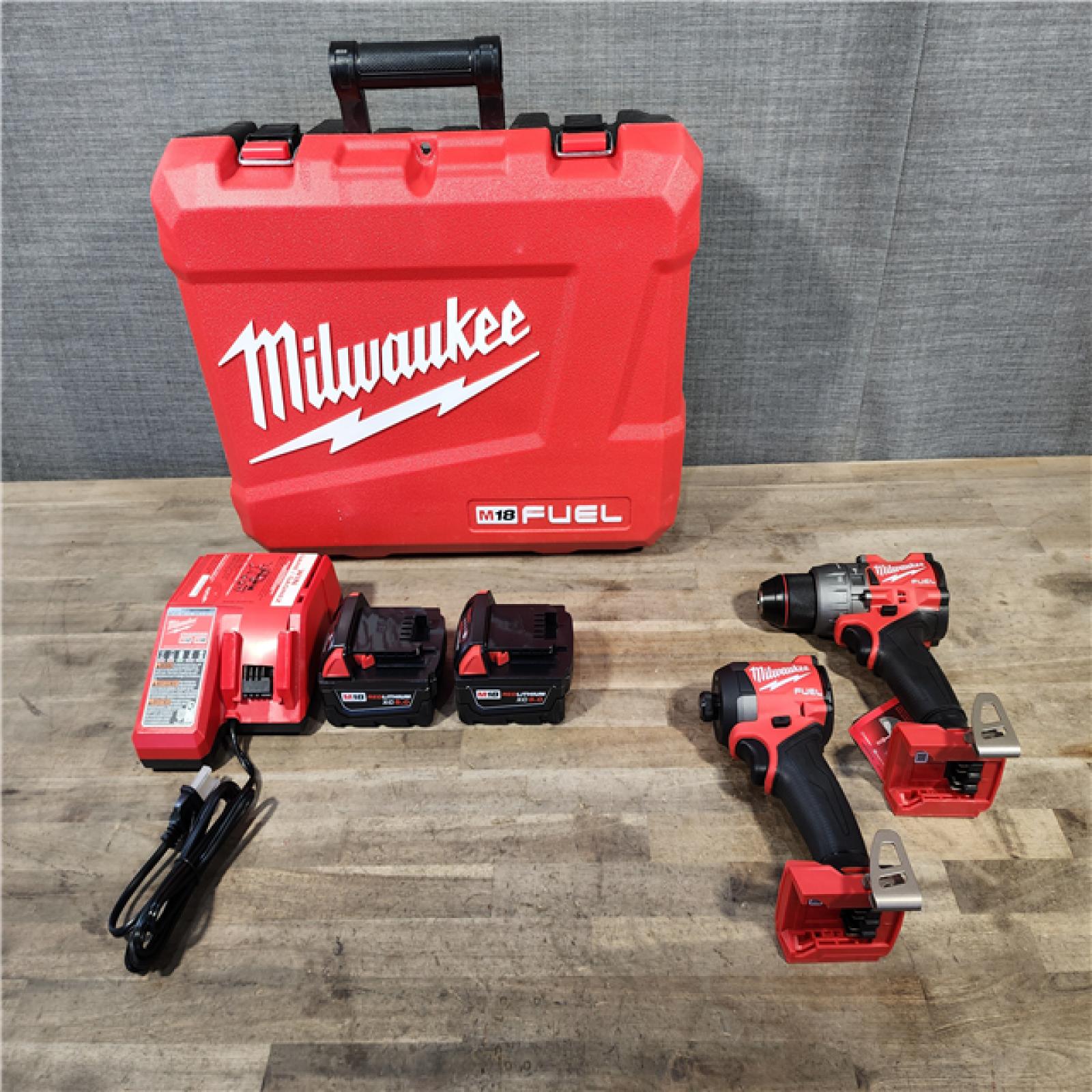 HOUSTON LOCATION - AS-IS (APPEARS LIKE NEW) MILWAUKEE FUEL 18V Lithium-Ion Brushless Cordless Hammer Drill and Impact Driver Combo Kit