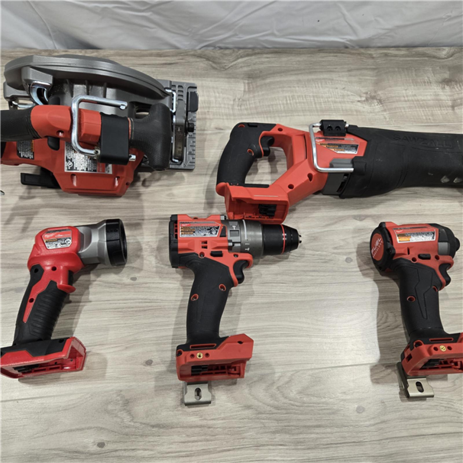 AS-IS M18 FUEL 18V Lithium-Ion Brushless Cordless Combo Kit (5-Tool) with Two 5.0 Ah Batteries, 1 Charger 1 Tool Bag