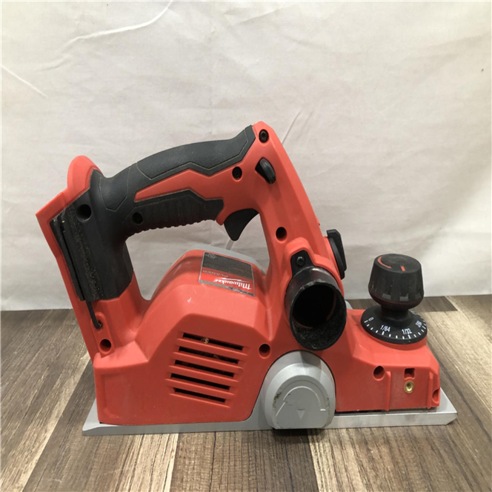 AS-IS Milwaukee 18V Lithium-Ion Cordless 3-1/4 in. Planer (Tool-Only)