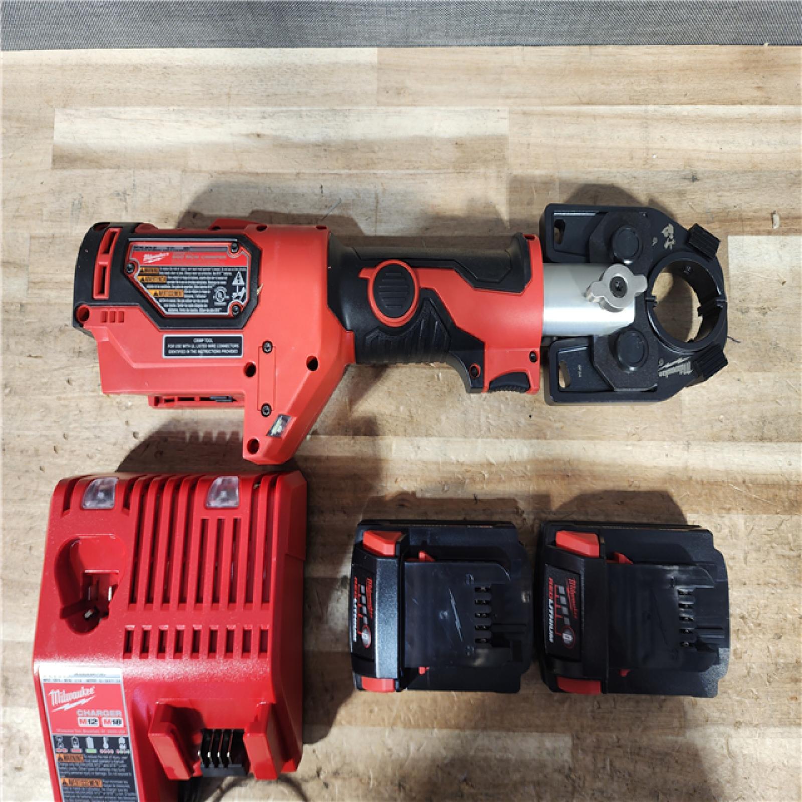 HOUSTON LOCATION - AS - IS Milwaukee 2697-22 M18 18-Volt 1/2-Inch 2-Tool Combo Kit Includes Charger  Battery (2) and Bag