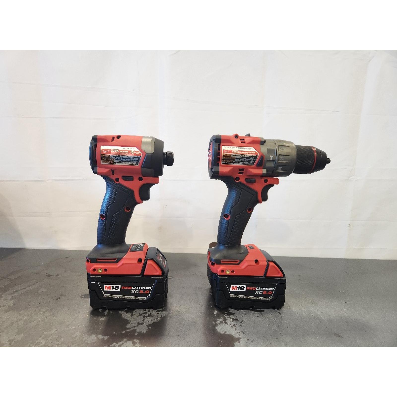 AS-IS- MILWAUKEE FUEL 18V Lithium-Ion Brushless Cordless Hammer Drill and Impact Driver Combo Kit