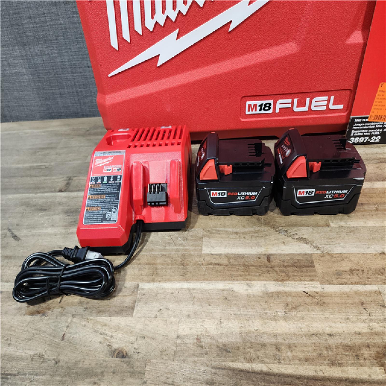 HOUSTON LOCATION - AS-IS (APPEARS LIKE NEW) Milwaukee  FUEL 18V Lithium-Ion Brushless Cordless Hammer Drill and Impact Driver Combo Kit