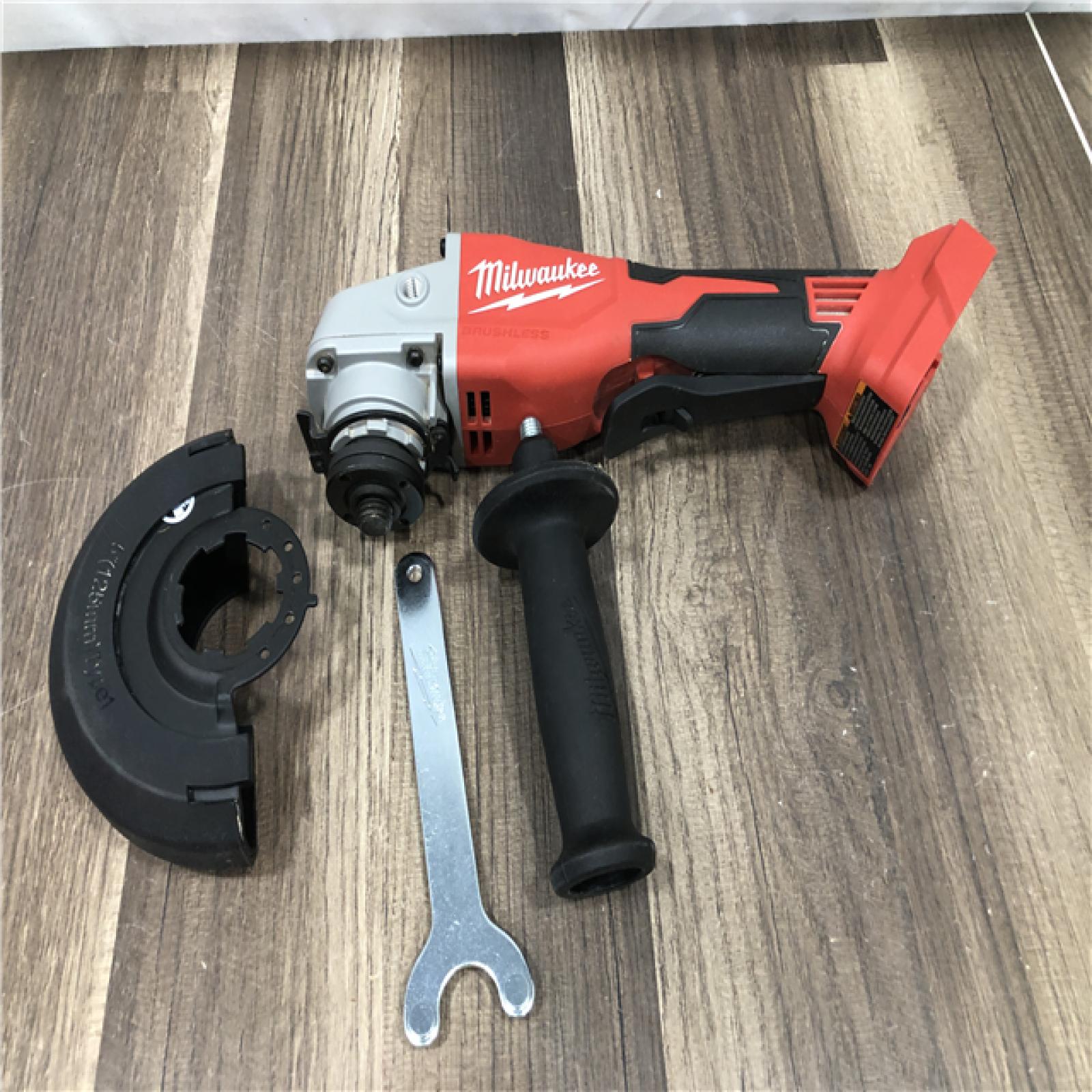 AS-IS Milwaukee 18V Lithium-Ion Brushless Cordless 4-1/2 in./5 in. Grinder w/Paddle Switch (Tool-Only)