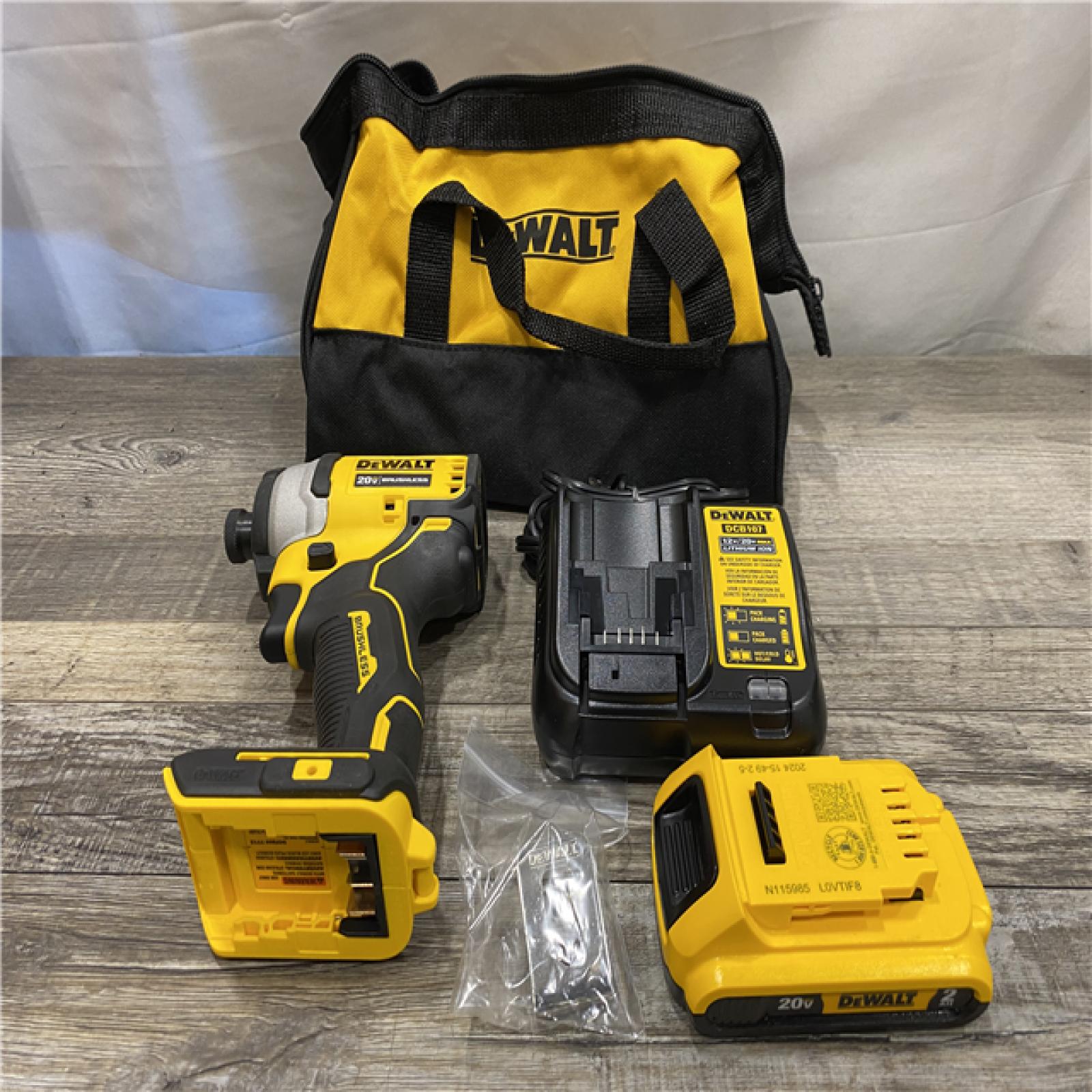 AS-IS DEWALT Atomic 20V Max Lithium-Ion Brushless Cordless Compact 1/4 in. Impact Driver Kit
